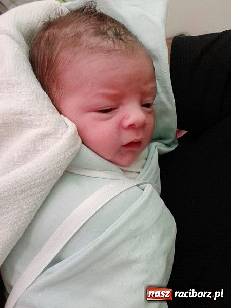 Zdjęcie w galerii na portalu naszraciborz.pl: Bożena i Przemek się radowali, kiedy małego Krzysia na świecie witali wiadomości z regionu