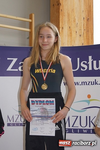 Zdjęcie w galerii na portalu naszraciborz.pl: Pływanie. Wiktoria z pięcioma medalami  wiadomości z regionu