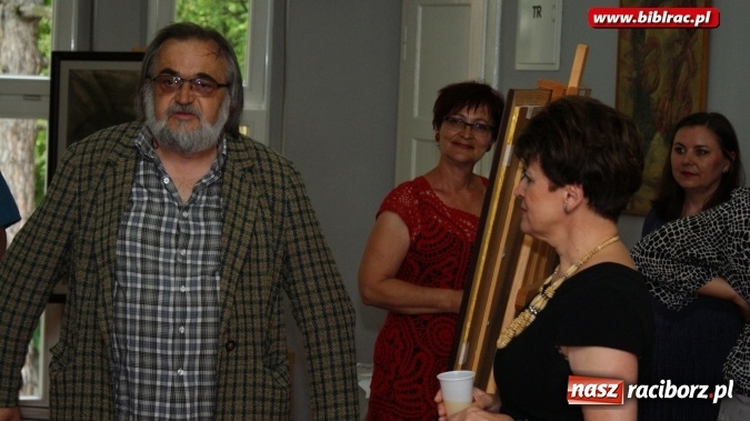 Zdjęcie w galerii na portalu naszraciborz.pl: Wernisaż wystawy prac Henryka M. Korbańskiego w bibliotece  wiadomości z regionu