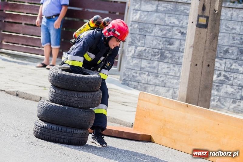 Zdjęcie w galerii na portalu naszraciborz.pl: Żelazny jak strażak w Krzanowicach. Patryk Wyglenda z pucharem prezesa OSP Krzanowice wiadomości z regionu