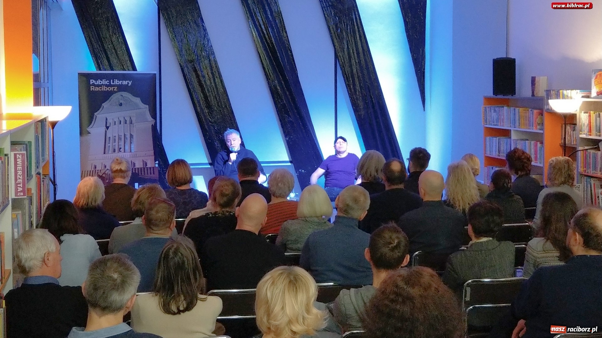 Zdjęcie w galerii na portalu naszraciborz.pl: Lżejszy od fotografii. Piotr Stelmach i Leszek Biolik gośćmi spotkania noworocznego w bibliotece wiadomości z regionu
