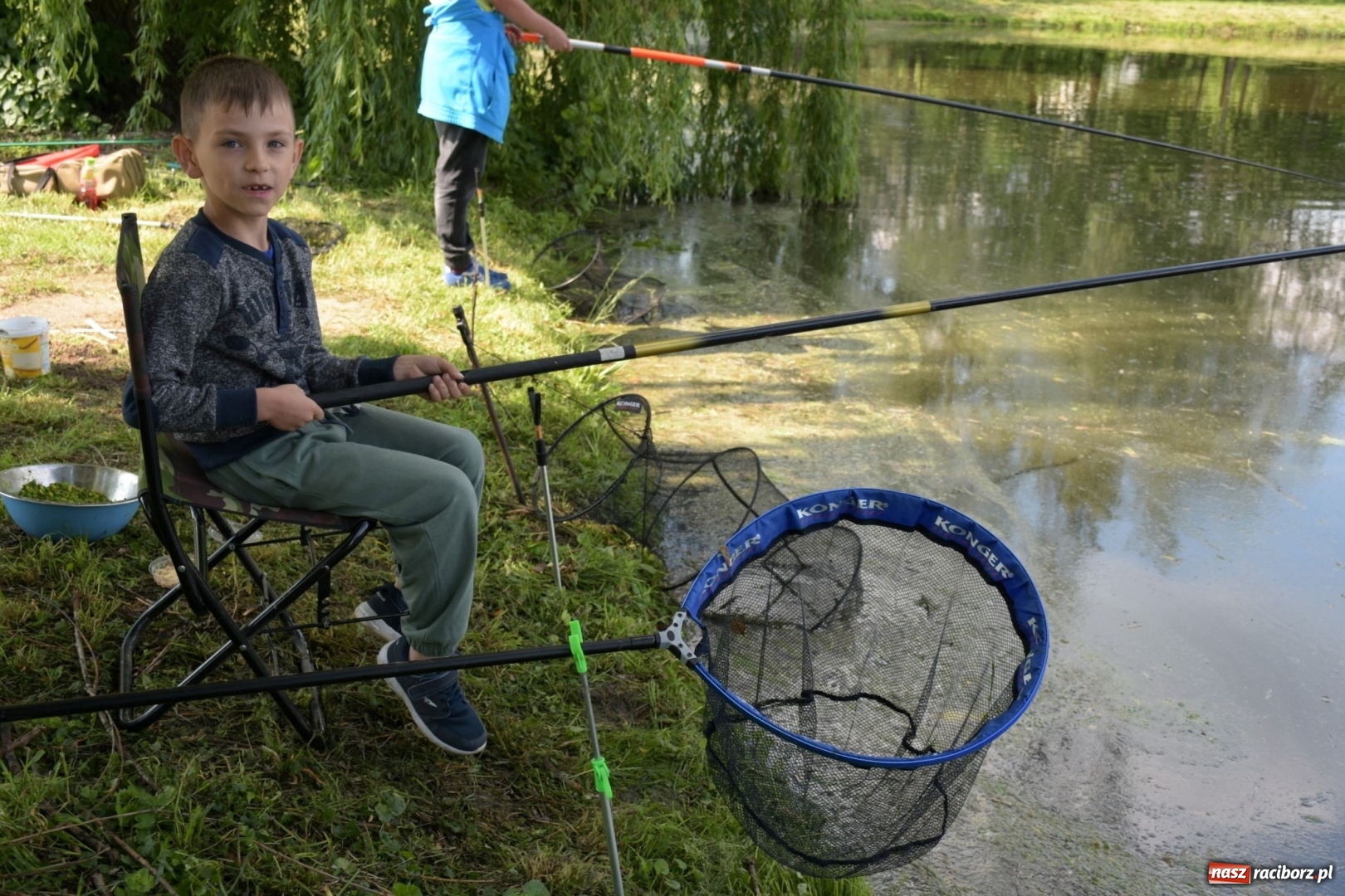 Zdjęcie w galerii na portalu naszraciborz.pl: Wędkarski Dzień Dziecka na Trzecioku  wiadomości z regionu