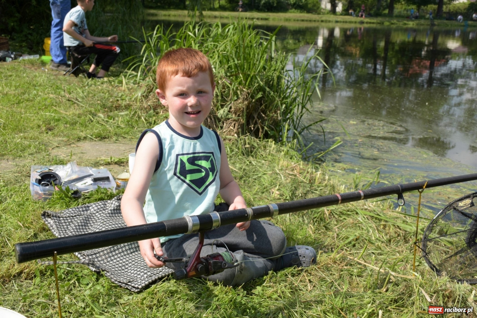 Zdjęcie w galerii na portalu naszraciborz.pl: Wędkarski Dzień Dziecka na Trzecioku  wiadomości z regionu