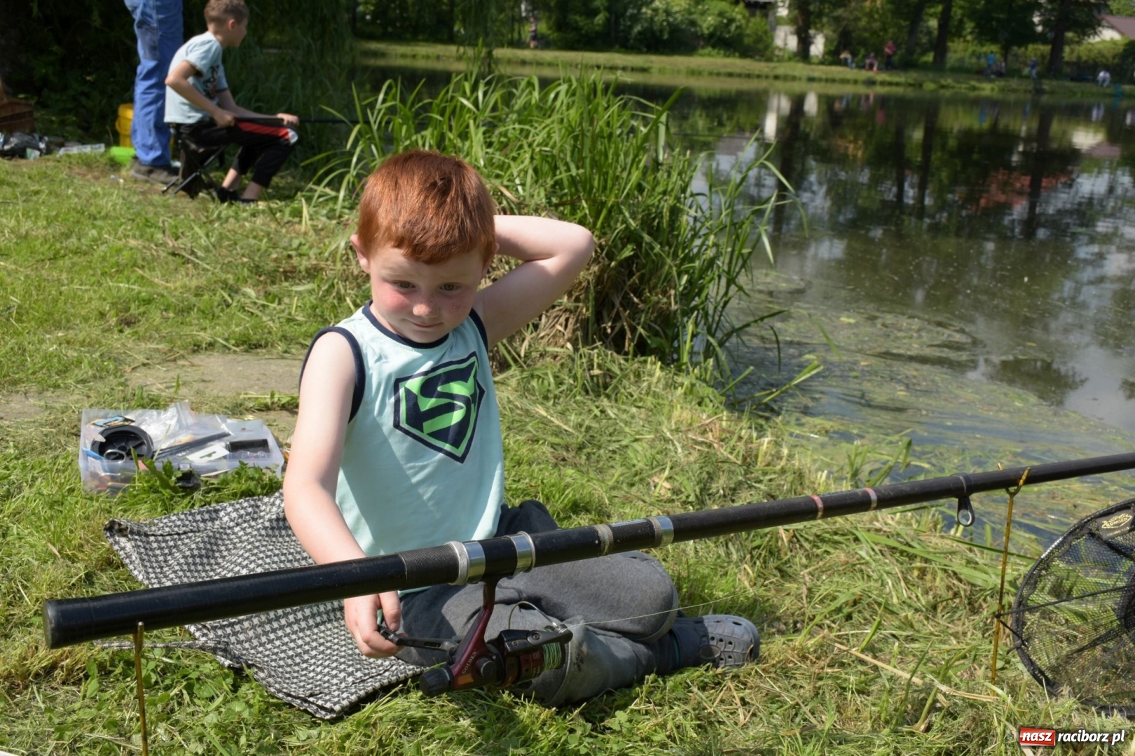 Zdjęcie w galerii na portalu naszraciborz.pl: Wędkarski Dzień Dziecka na Trzecioku  wiadomości z regionu