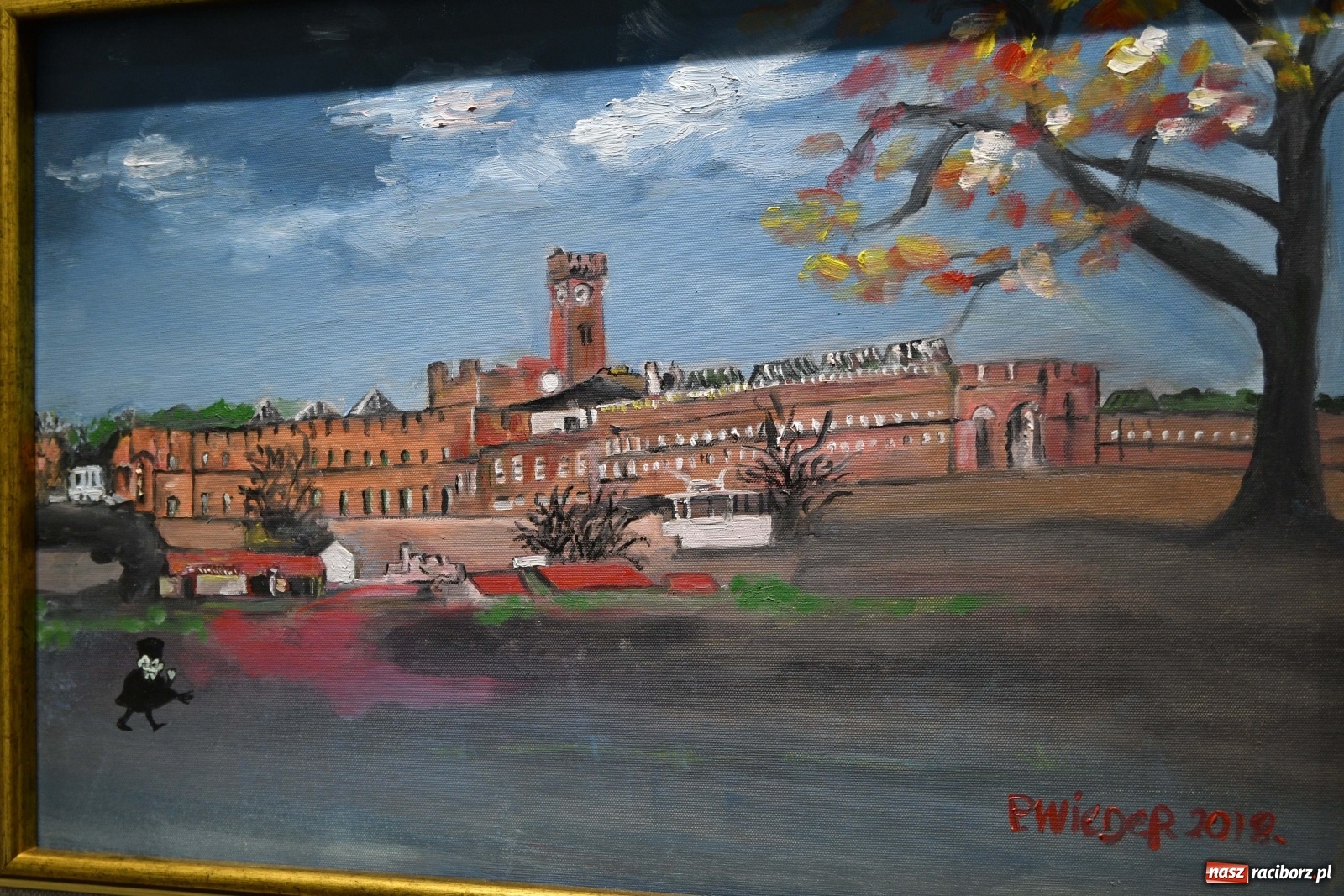 Zdjęcie w galerii na portalu naszraciborz.pl: Racibórz nieoczywisty. Obrazy Piotra Wiedera w książnicy wiadomości z regionu