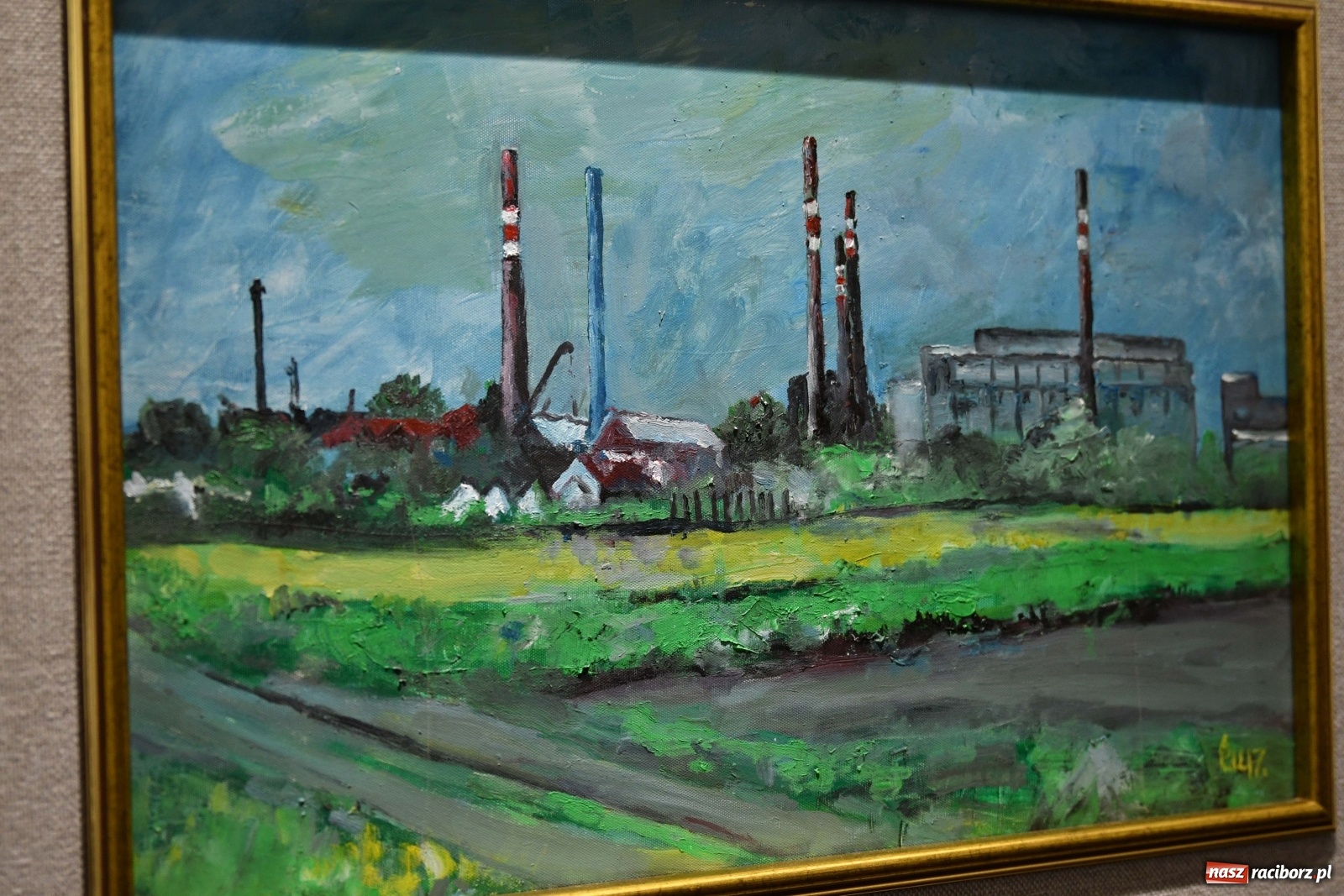 Zdjęcie w galerii na portalu naszraciborz.pl: Racibórz nieoczywisty. Obrazy Piotra Wiedera w książnicy wiadomości z regionu