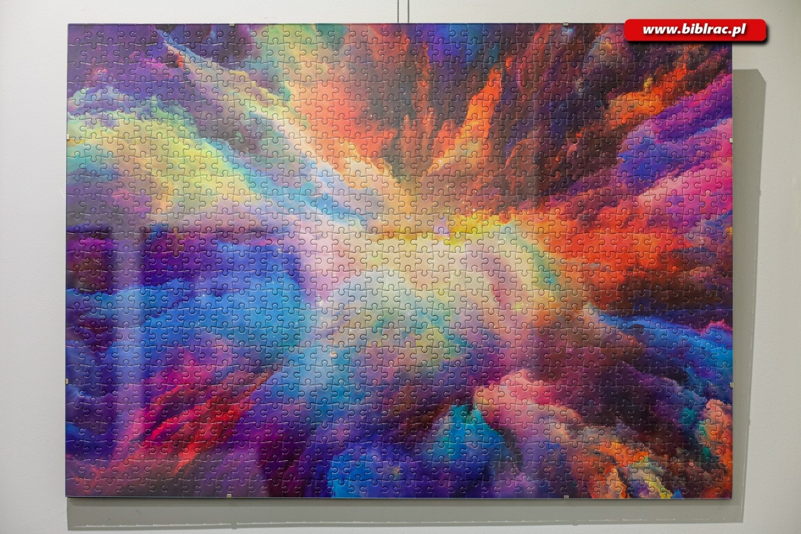 Zdjęcie w galerii na portalu naszraciborz.pl: Sztuka z puzzli. W bibliotece odbył się wernisaż wystawy Jana Świerczka wiadomości z regionu