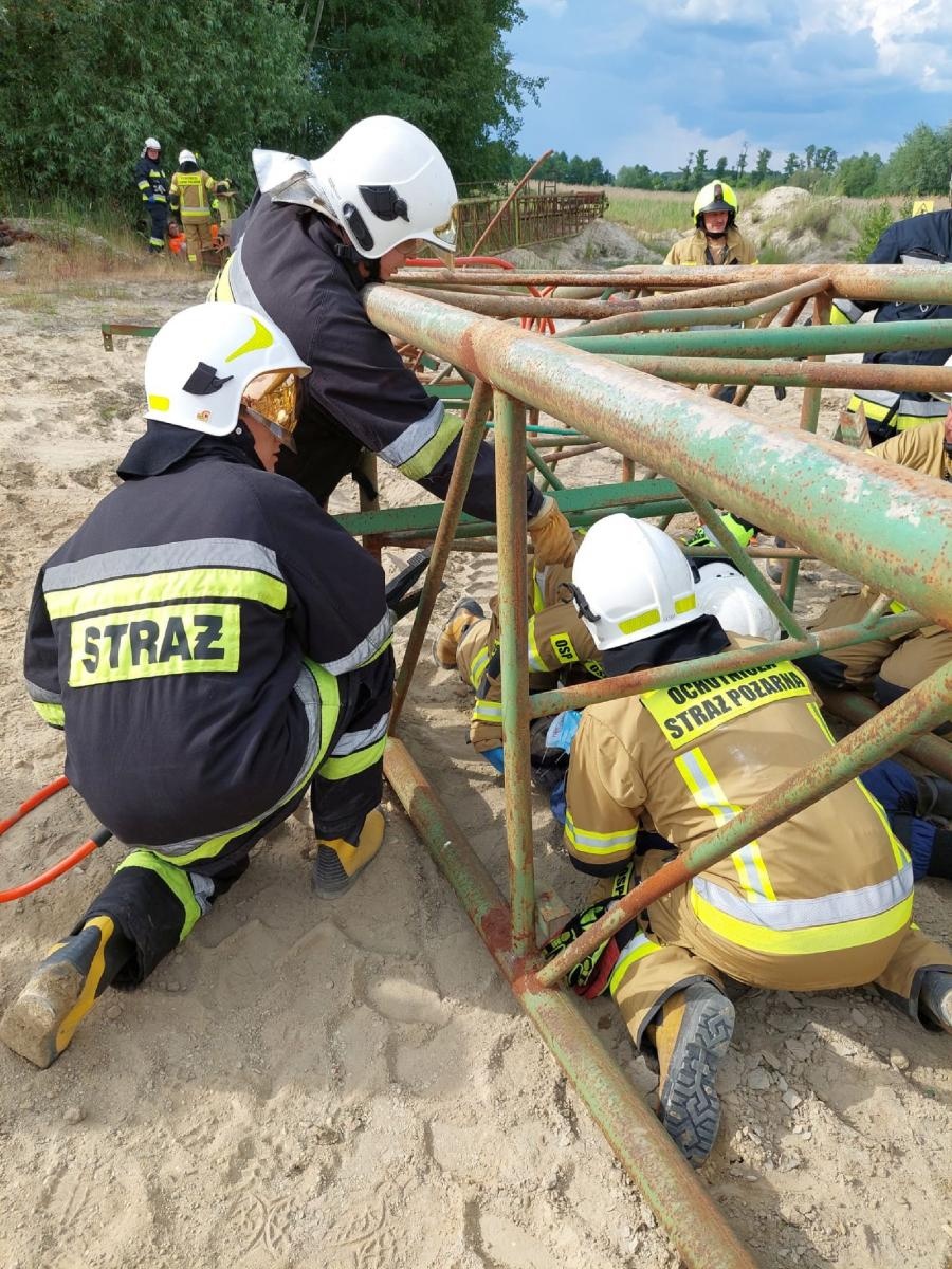 Zdjęcie w galerii na portalu naszraciborz.pl: PIASKOWNIA 2023 - jednostki z gm. Kuźnia Raciborska ćwiczyły na terenie kopalni wiadomości z regionu