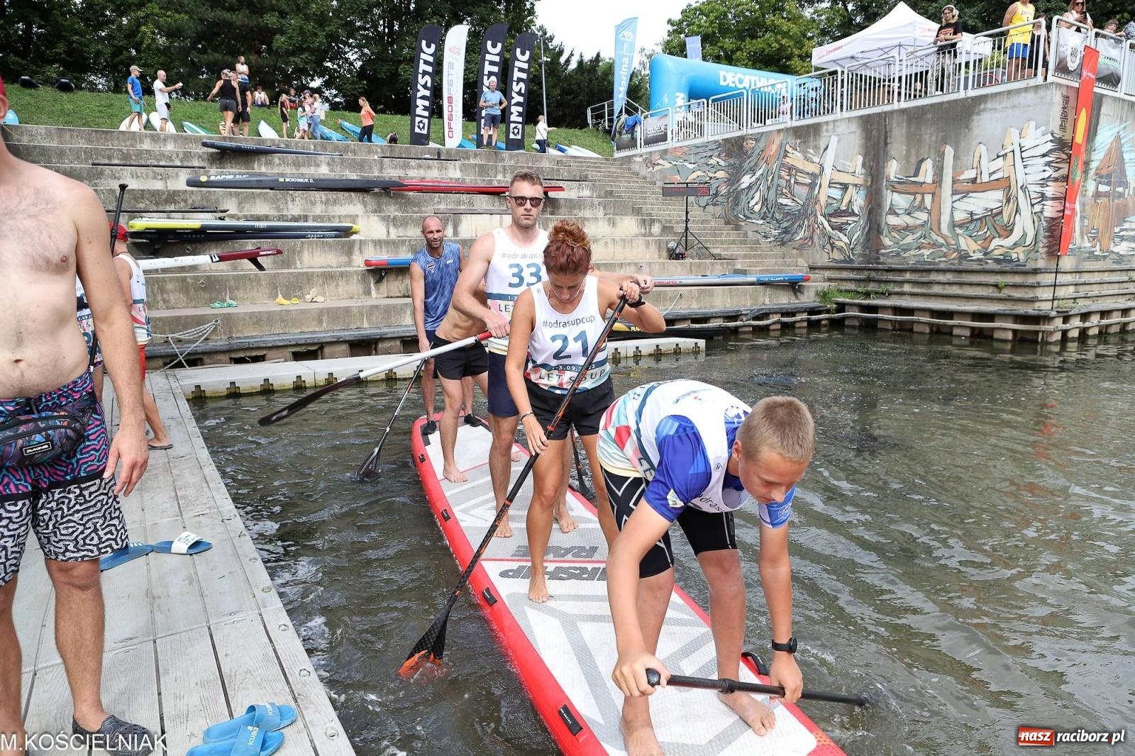 Zdjęcie w galerii na portalu naszraciborz.pl: Odra SUP CUP 2023. Wyścigi DRAGON RACE pod zamkiem wiadomości z regionu