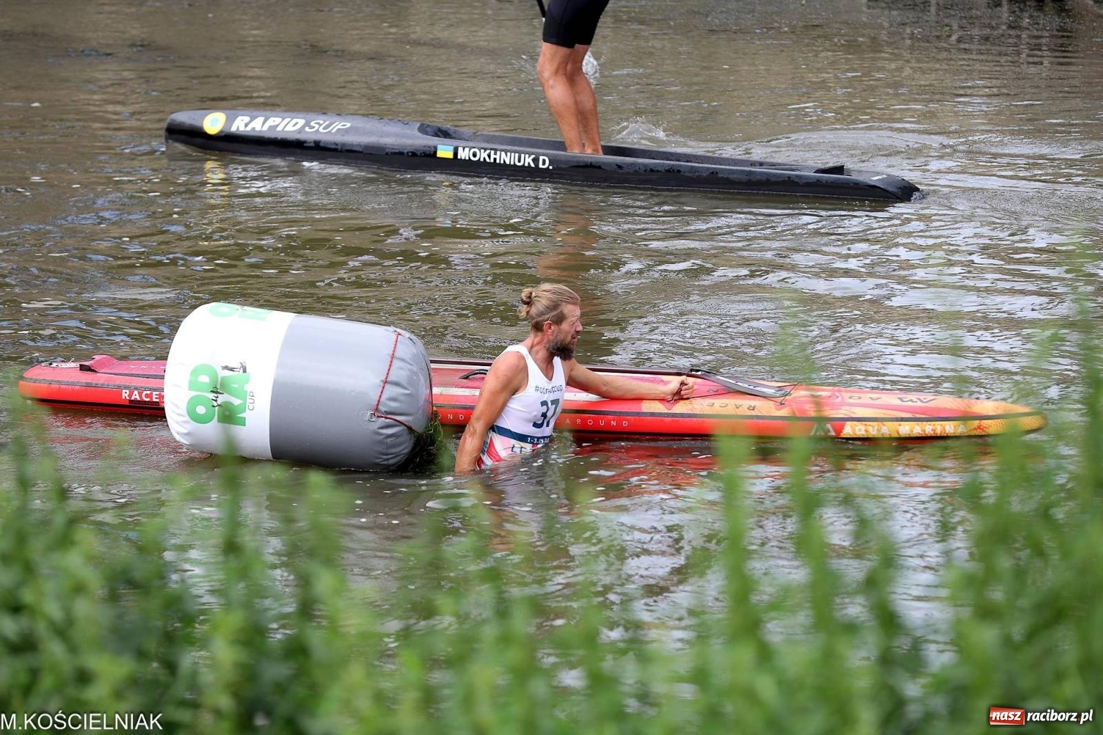 Zdjęcie w galerii na portalu naszraciborz.pl: Odra SUP CUP 2023. Wyścigi DRAGON RACE pod zamkiem wiadomości z regionu