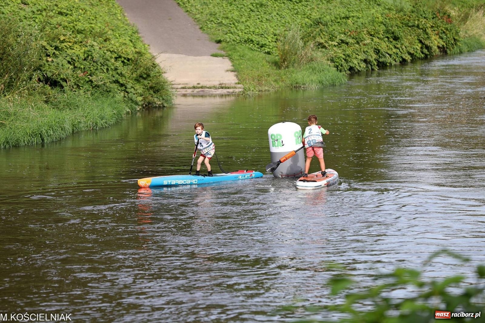 Zdjęcie w galerii na portalu naszraciborz.pl: Odra SUP CUP 2023. Wyścigi DRAGON RACE pod zamkiem wiadomości z regionu