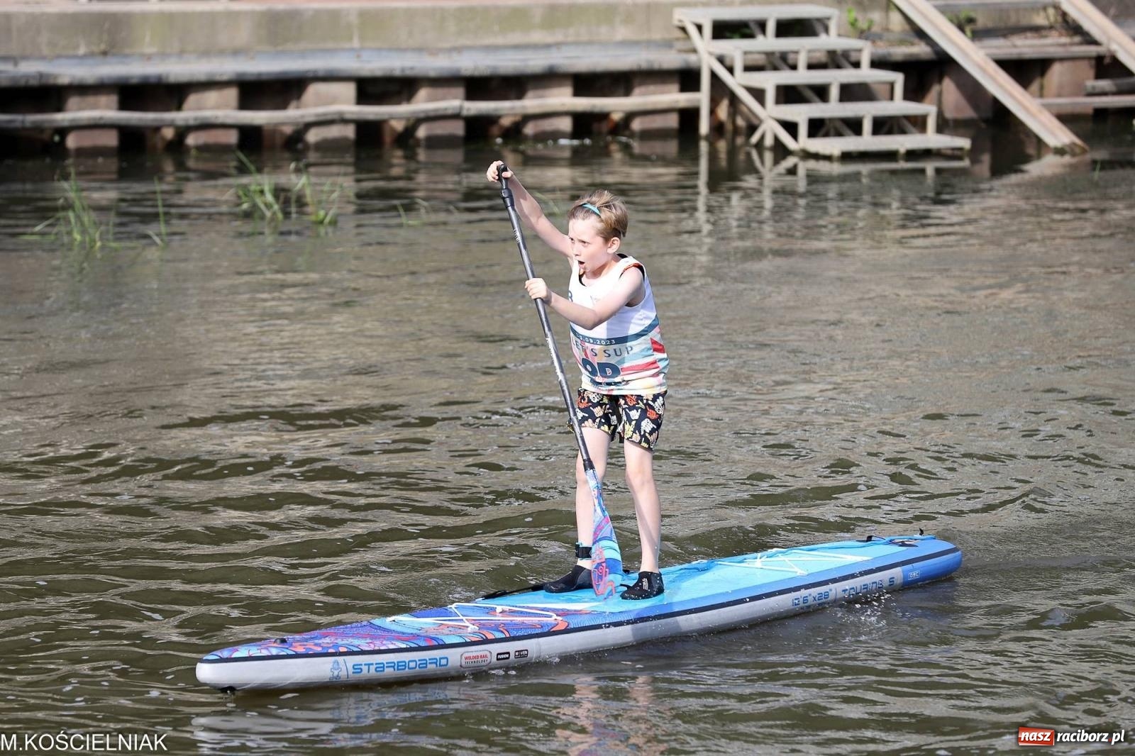 Zdjęcie w galerii na portalu naszraciborz.pl: Odra SUP CUP 2023. Wyścigi DRAGON RACE pod zamkiem wiadomości z regionu