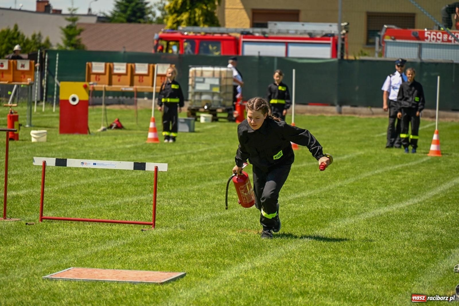 Zdjęcie w galerii na portalu naszraciborz.pl: Cała pula dla Roszkowa. Gminne zawody sportowo-pożarnicze w Krzyżanowicach wiadomości z regionu