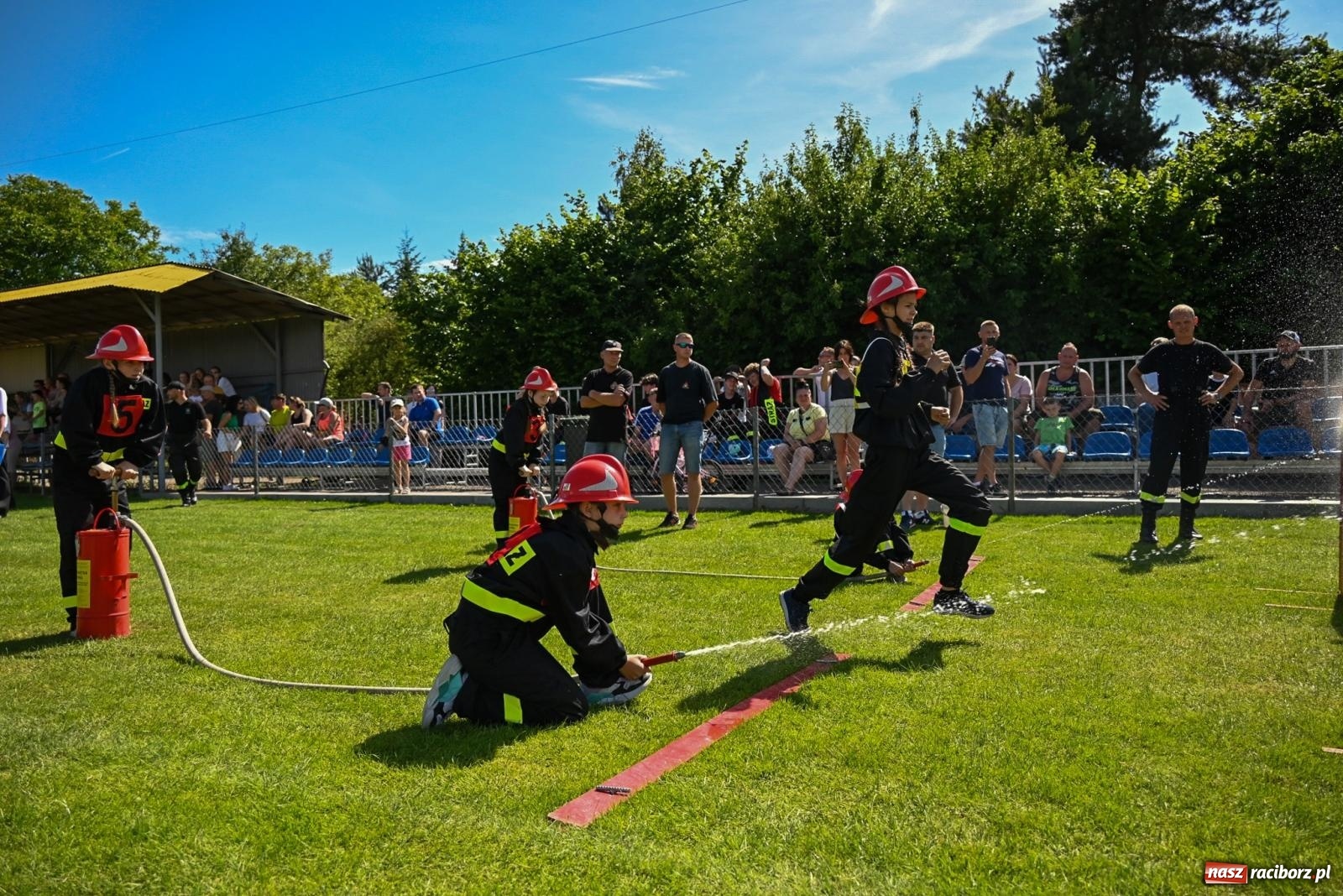 Zdjęcie w galerii na portalu naszraciborz.pl: Cała pula dla Roszkowa. Gminne zawody sportowo-pożarnicze w Krzyżanowicach wiadomości z regionu
