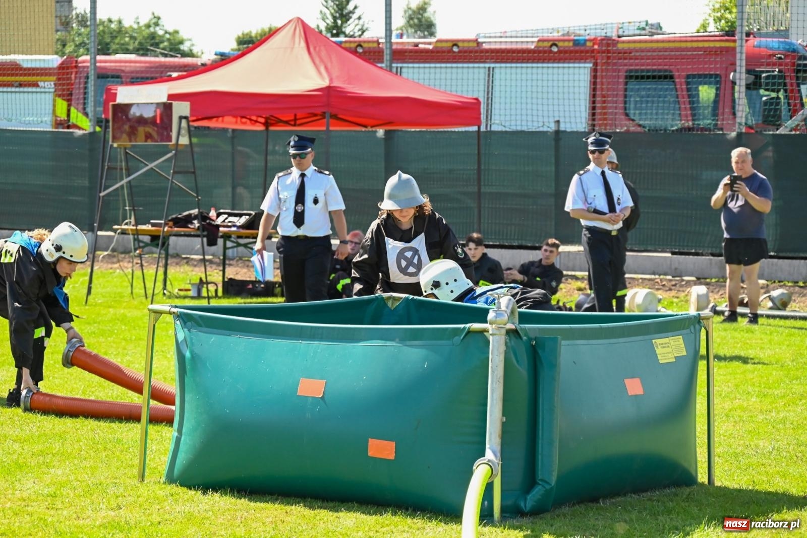 Zdjęcie w galerii na portalu naszraciborz.pl: Cała pula dla Roszkowa. Gminne zawody sportowo-pożarnicze w Krzyżanowicach wiadomości z regionu