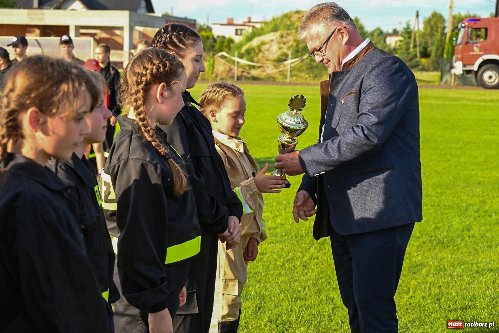 Zdjęcie w galerii na portalu naszraciborz.pl: Cała pula dla Roszkowa. Gminne zawody sportowo-pożarnicze w Krzyżanowicach wiadomości z regionu