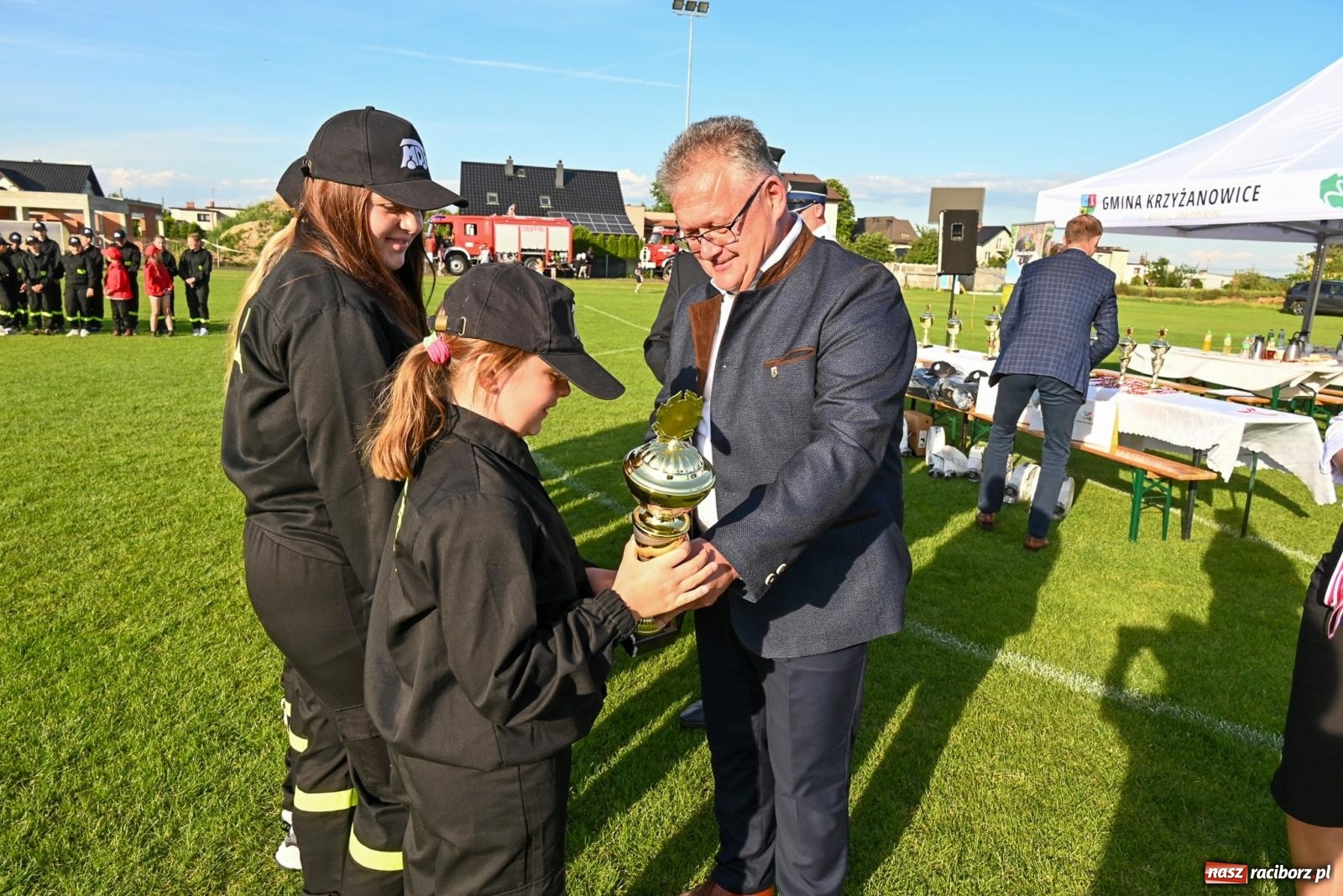 Zdjęcie w galerii na portalu naszraciborz.pl: Cała pula dla Roszkowa. Gminne zawody sportowo-pożarnicze w Krzyżanowicach wiadomości z regionu