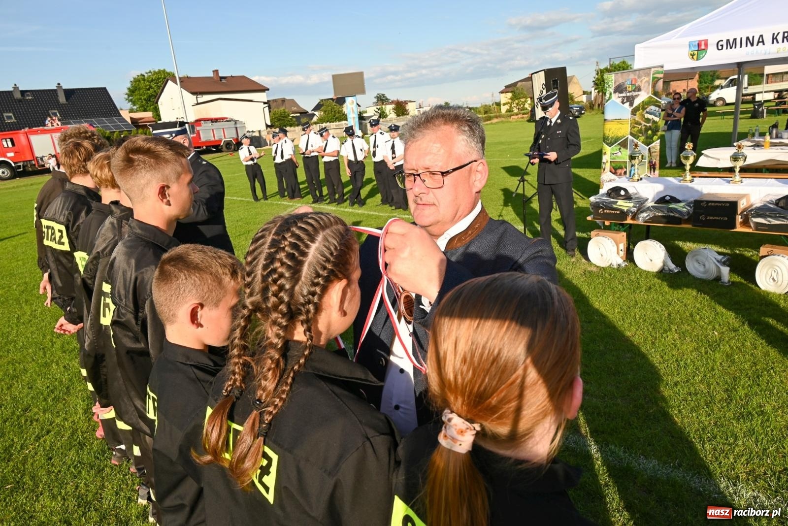 Zdjęcie w galerii na portalu naszraciborz.pl: Cała pula dla Roszkowa. Gminne zawody sportowo-pożarnicze w Krzyżanowicach wiadomości z regionu