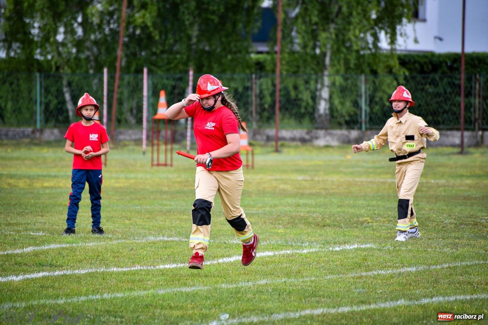 Zdjęcie w galerii na portalu naszraciborz.pl: Zawody sportowo-pożarnicze w Górkach Śląskich. Strażacka rywalizacja mimo kapryśnej pogody wiadomości z regionu