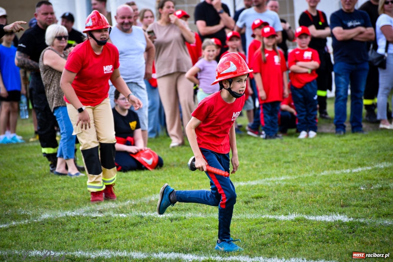 Zdjęcie w galerii na portalu naszraciborz.pl: Zawody sportowo-pożarnicze w Górkach Śląskich. Strażacka rywalizacja mimo kapryśnej pogody wiadomości z regionu