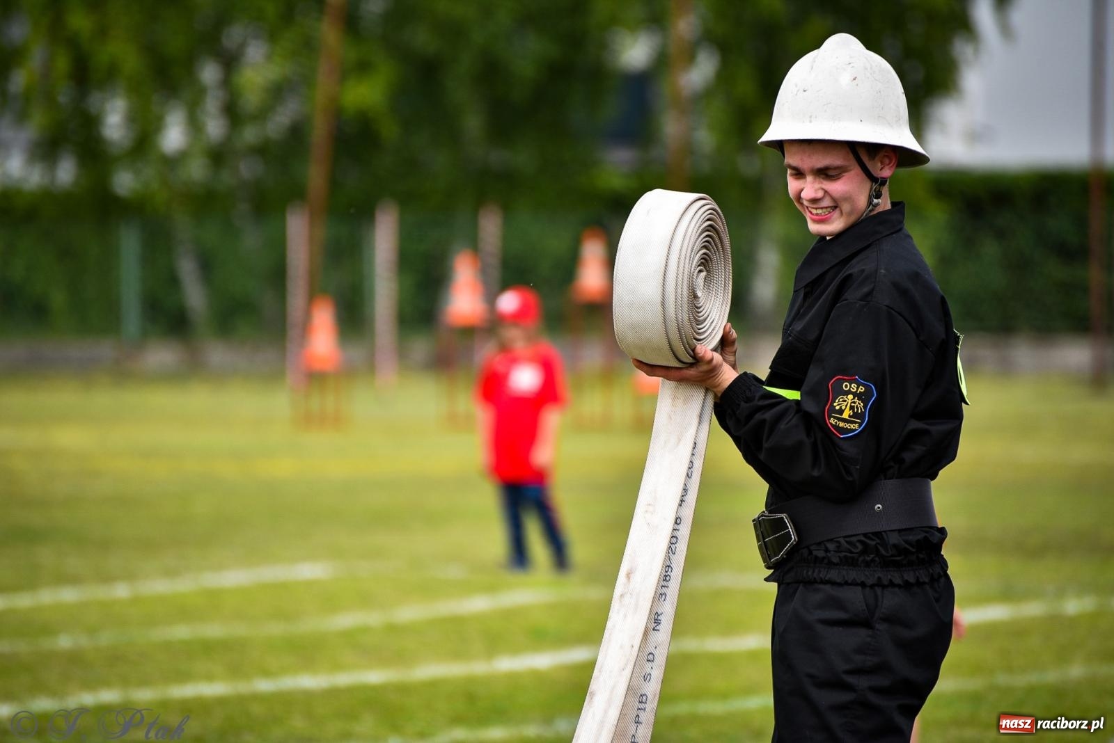 Zdjęcie w galerii na portalu naszraciborz.pl: Zawody sportowo-pożarnicze w Górkach Śląskich. Strażacka rywalizacja mimo kapryśnej pogody wiadomości z regionu