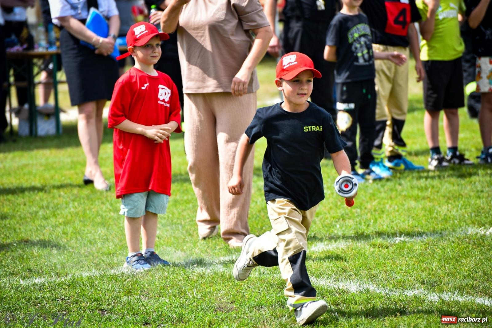 Zdjęcie w galerii na portalu naszraciborz.pl: Zawody sportowo-pożarnicze w Górkach Śląskich. Strażacka rywalizacja mimo kapryśnej pogody wiadomości z regionu