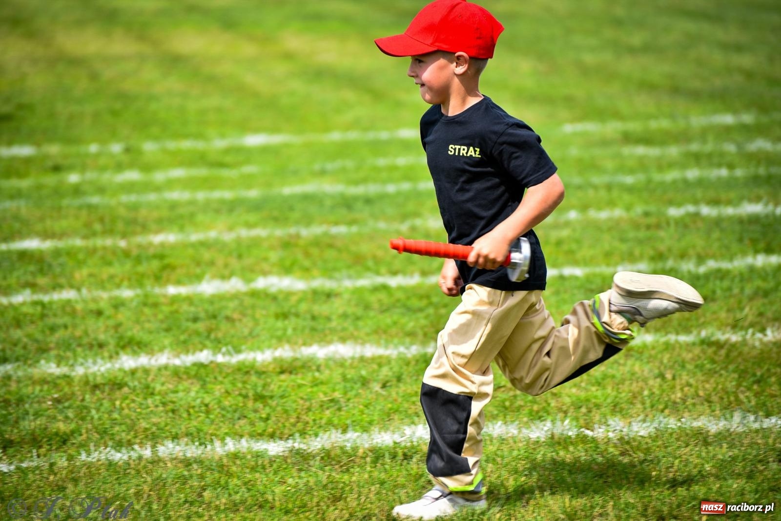 Zdjęcie w galerii na portalu naszraciborz.pl: Zawody sportowo-pożarnicze w Górkach Śląskich. Strażacka rywalizacja mimo kapryśnej pogody wiadomości z regionu