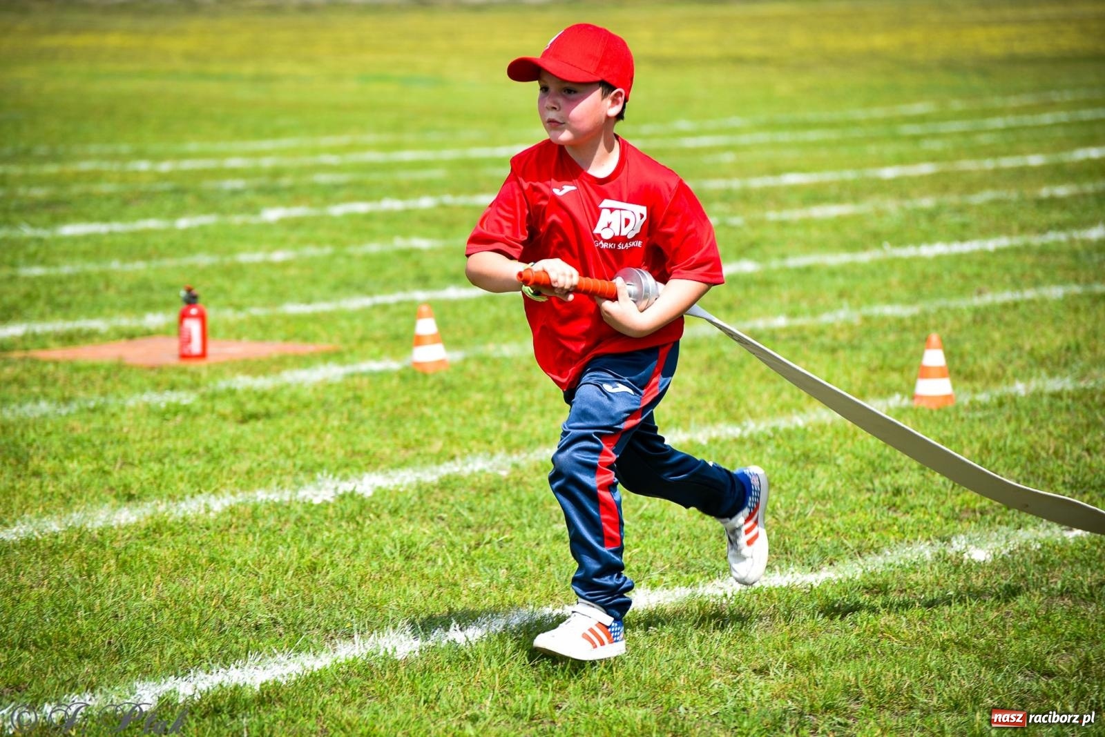 Zdjęcie w galerii na portalu naszraciborz.pl: Zawody sportowo-pożarnicze w Górkach Śląskich. Strażacka rywalizacja mimo kapryśnej pogody wiadomości z regionu