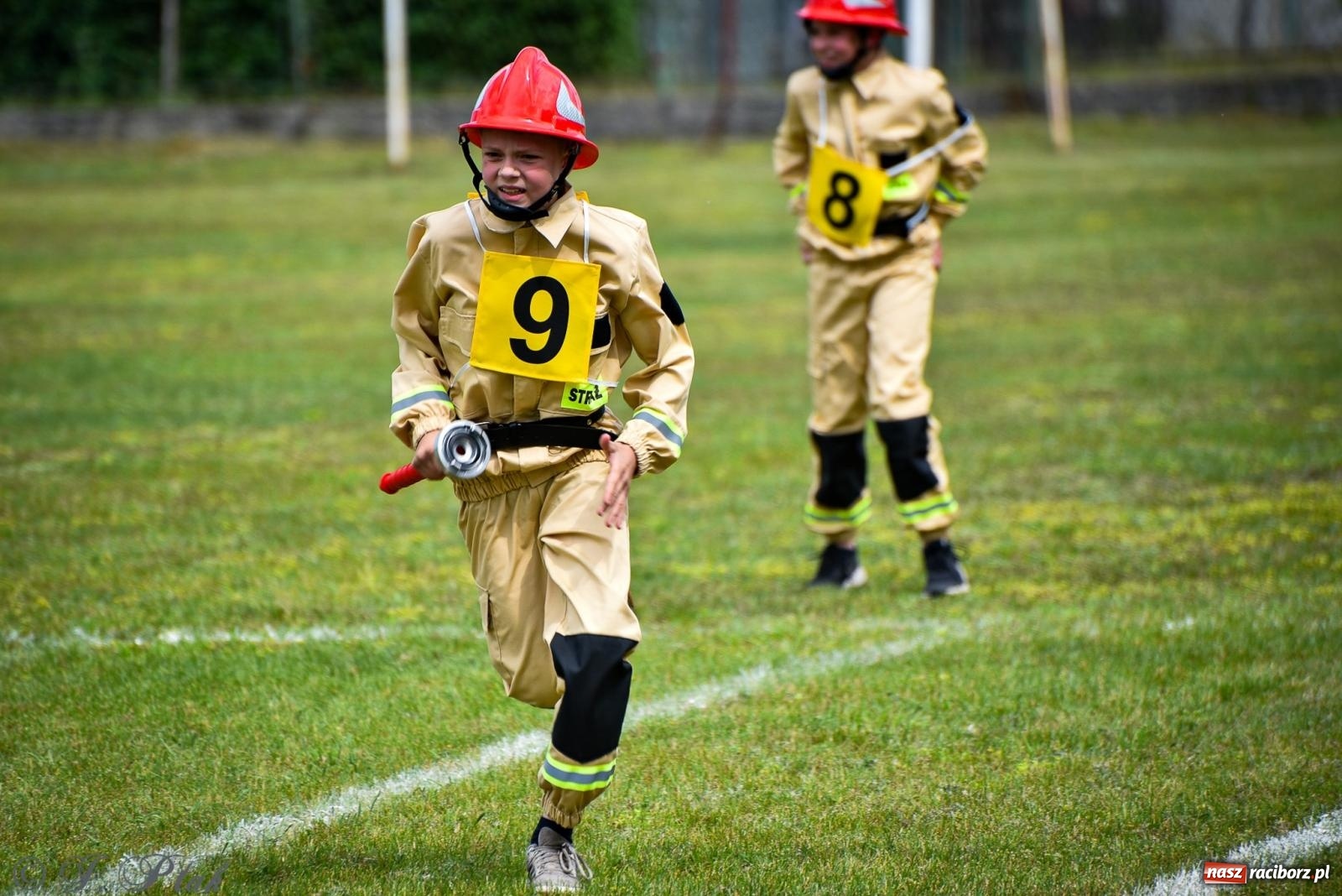 Zdjęcie w galerii na portalu naszraciborz.pl: Zawody sportowo-pożarnicze w Górkach Śląskich. Strażacka rywalizacja mimo kapryśnej pogody wiadomości z regionu