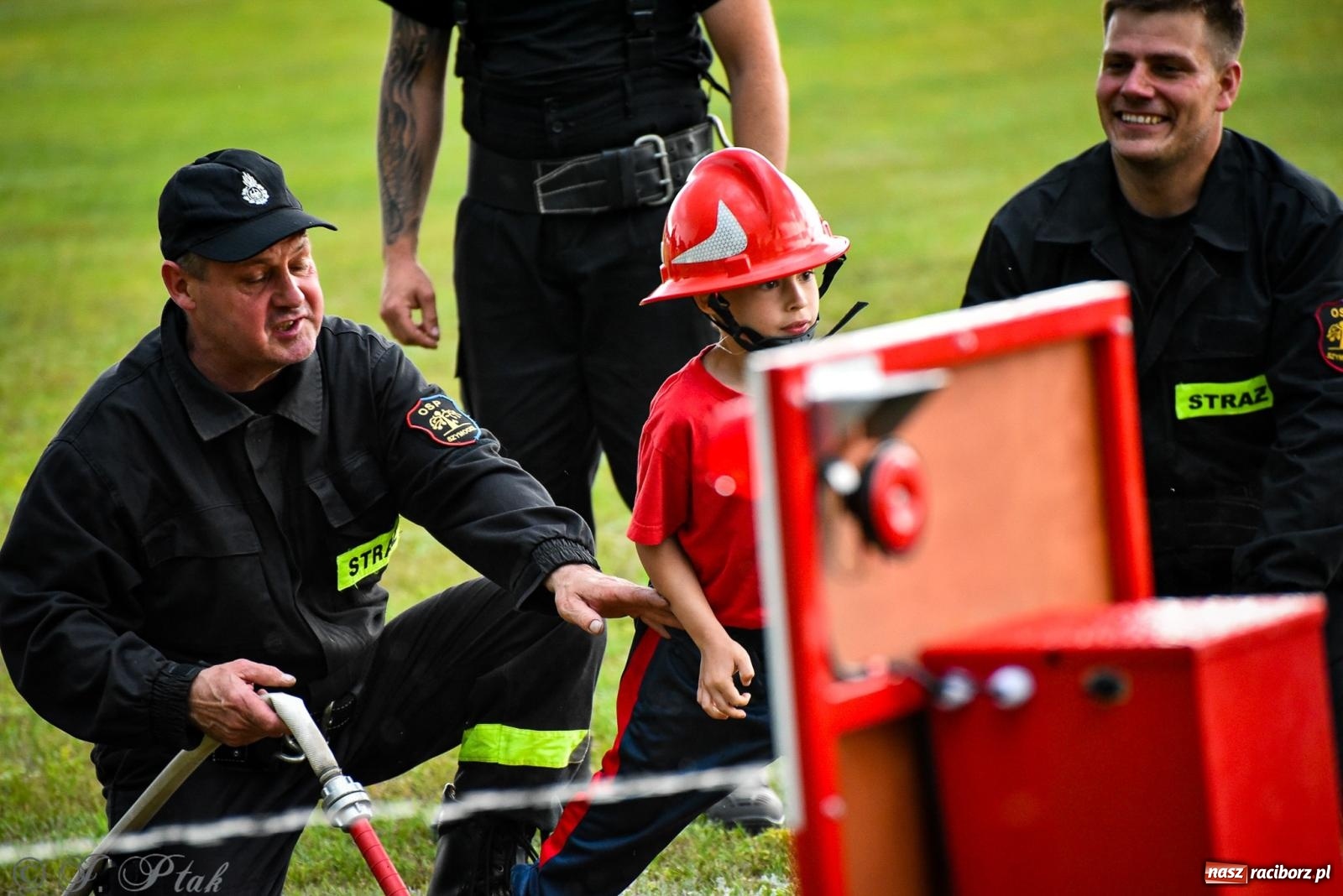 Zdjęcie w galerii na portalu naszraciborz.pl: Zawody sportowo-pożarnicze w Górkach Śląskich. Strażacka rywalizacja mimo kapryśnej pogody wiadomości z regionu
