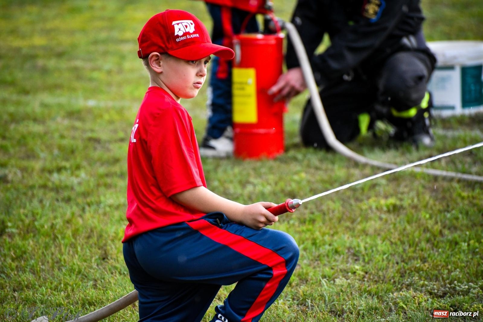 Zdjęcie w galerii na portalu naszraciborz.pl: Zawody sportowo-pożarnicze w Górkach Śląskich. Strażacka rywalizacja mimo kapryśnej pogody wiadomości z regionu