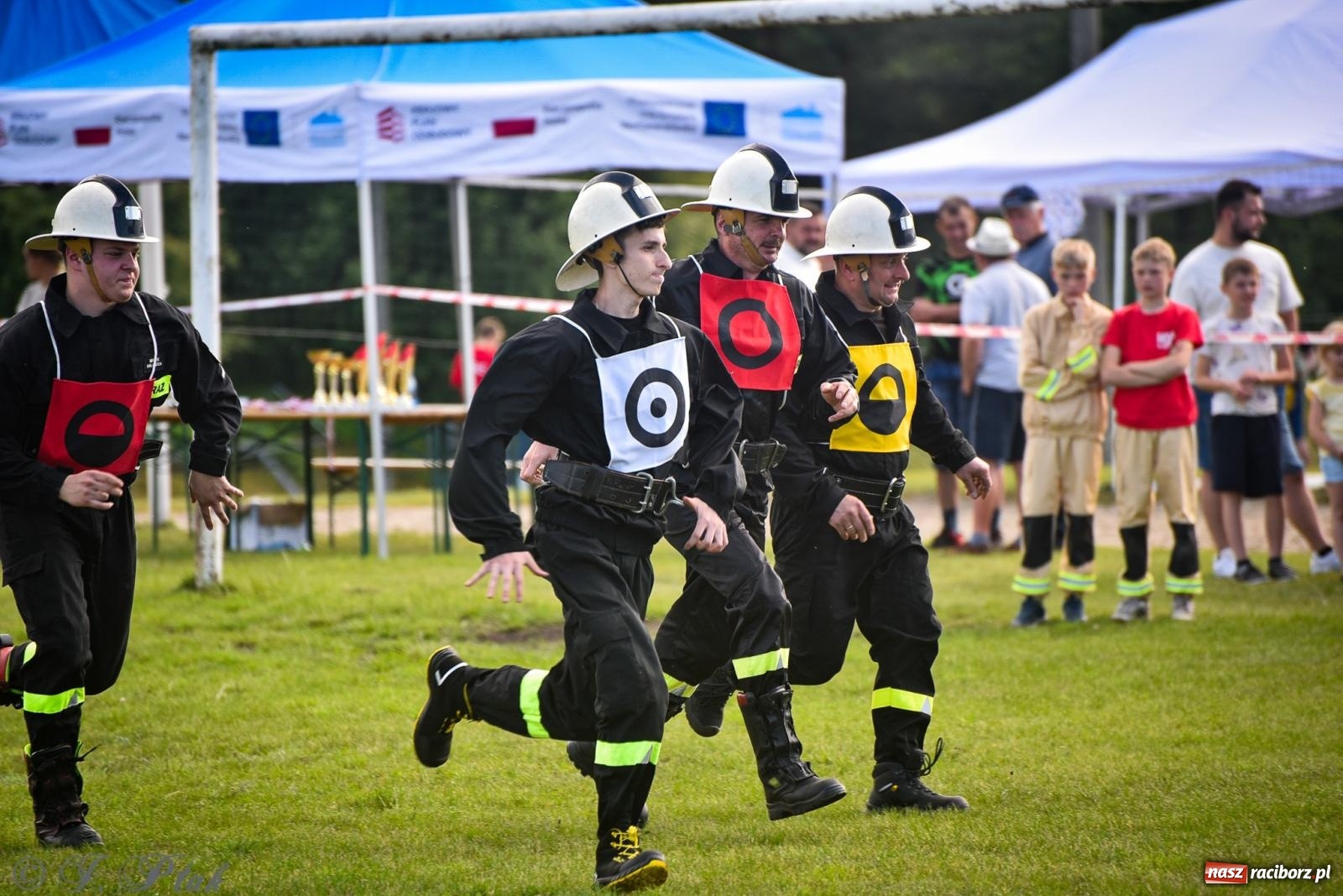 Zdjęcie w galerii na portalu naszraciborz.pl: Zawody sportowo-pożarnicze w Górkach Śląskich. Strażacka rywalizacja mimo kapryśnej pogody wiadomości z regionu