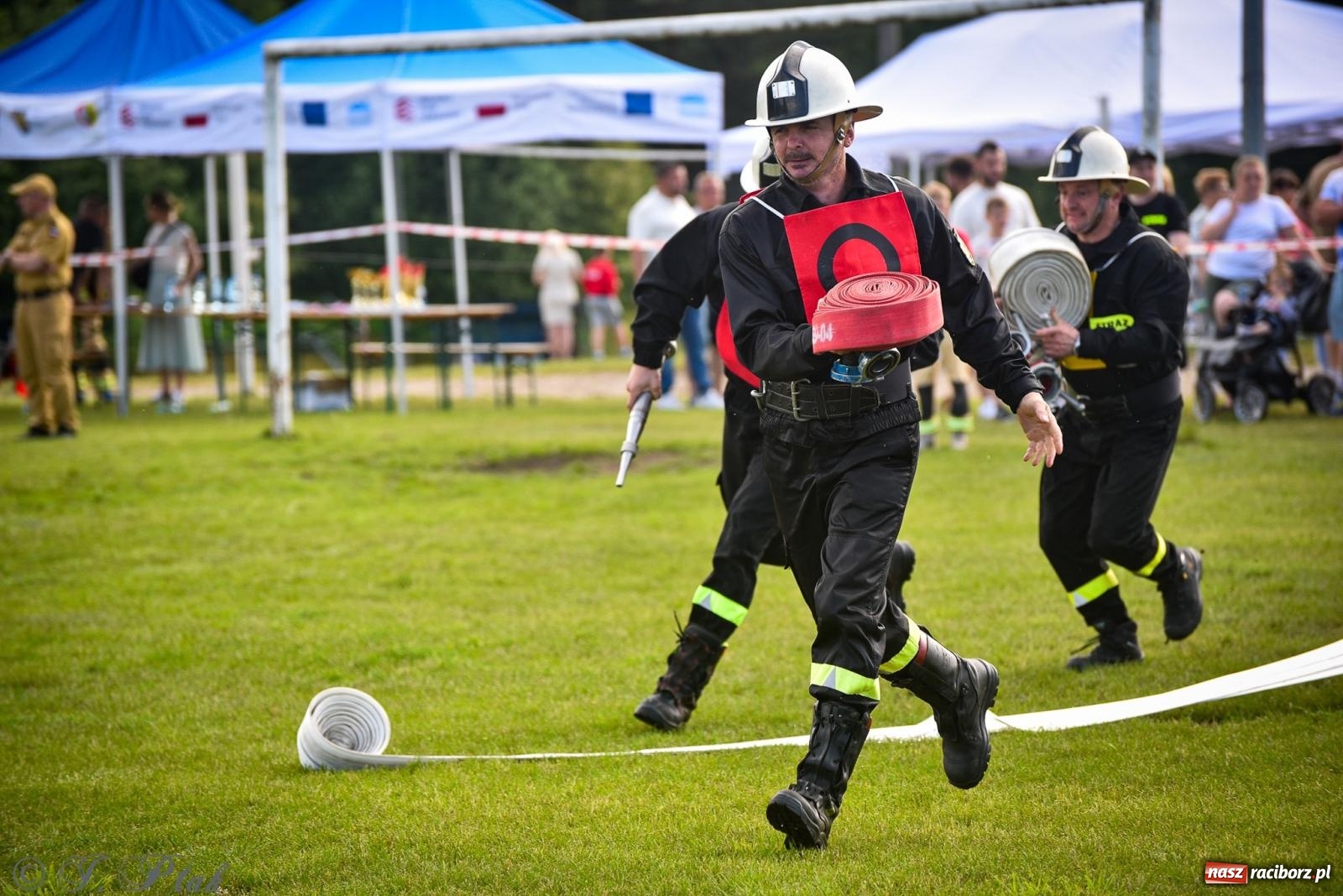 Zdjęcie w galerii na portalu naszraciborz.pl: Zawody sportowo-pożarnicze w Górkach Śląskich. Strażacka rywalizacja mimo kapryśnej pogody wiadomości z regionu