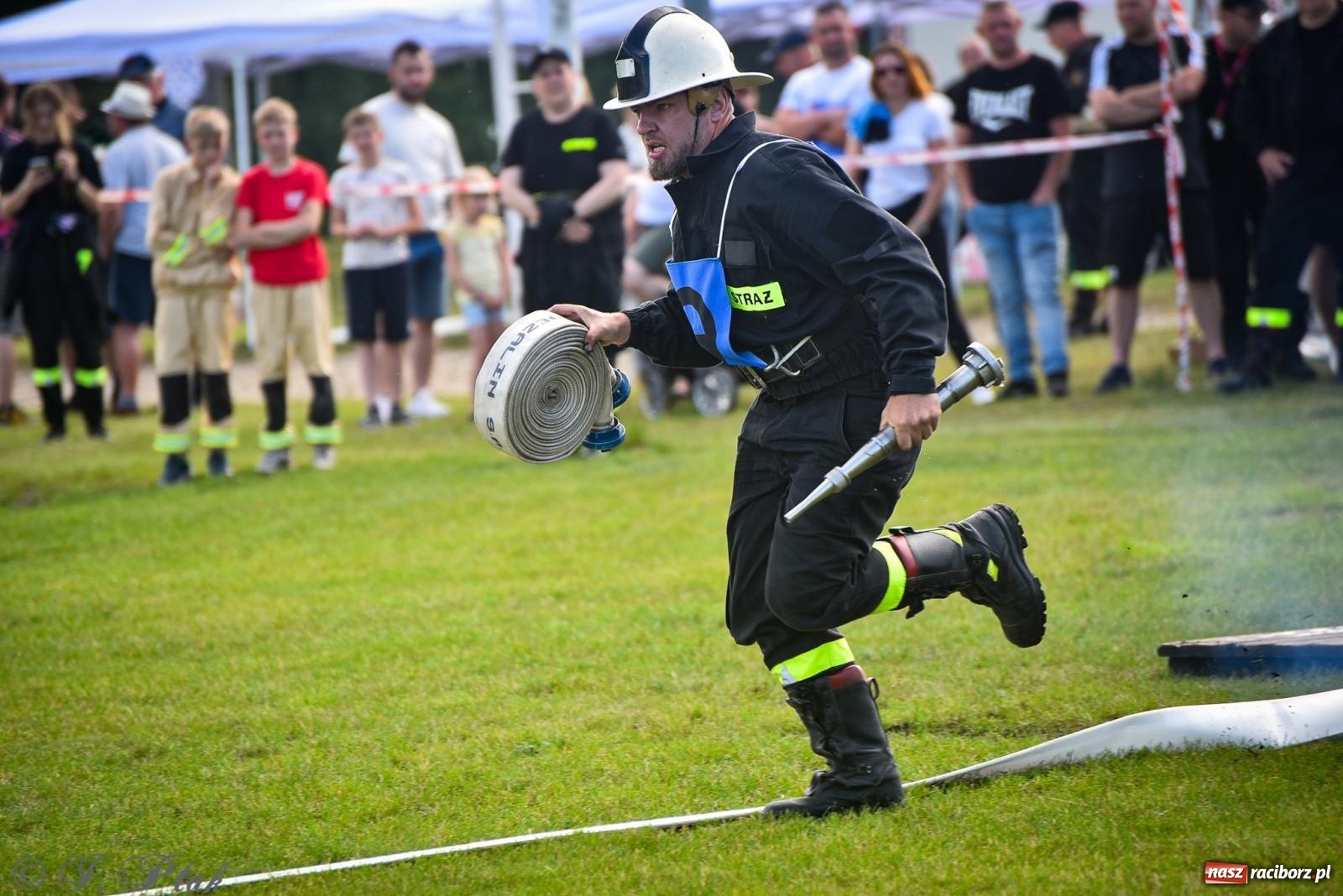 Zdjęcie w galerii na portalu naszraciborz.pl: Zawody sportowo-pożarnicze w Górkach Śląskich. Strażacka rywalizacja mimo kapryśnej pogody wiadomości z regionu