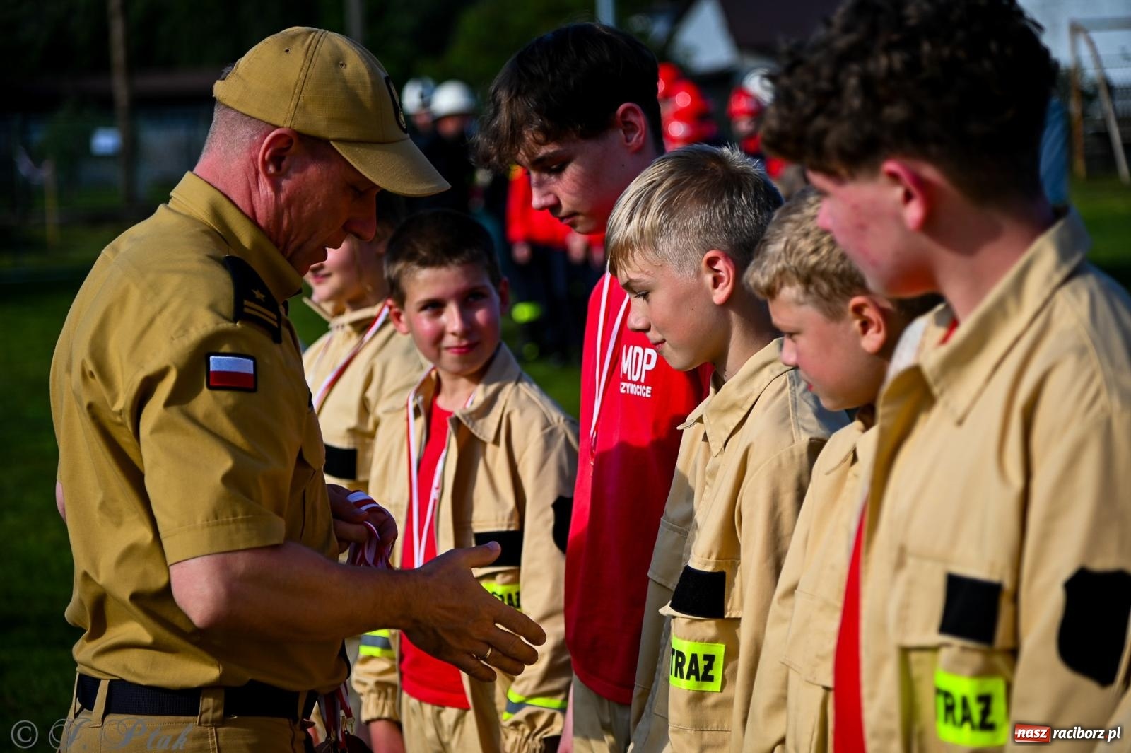 Zdjęcie w galerii na portalu naszraciborz.pl: Zawody sportowo-pożarnicze w Górkach Śląskich. Strażacka rywalizacja mimo kapryśnej pogody wiadomości z regionu