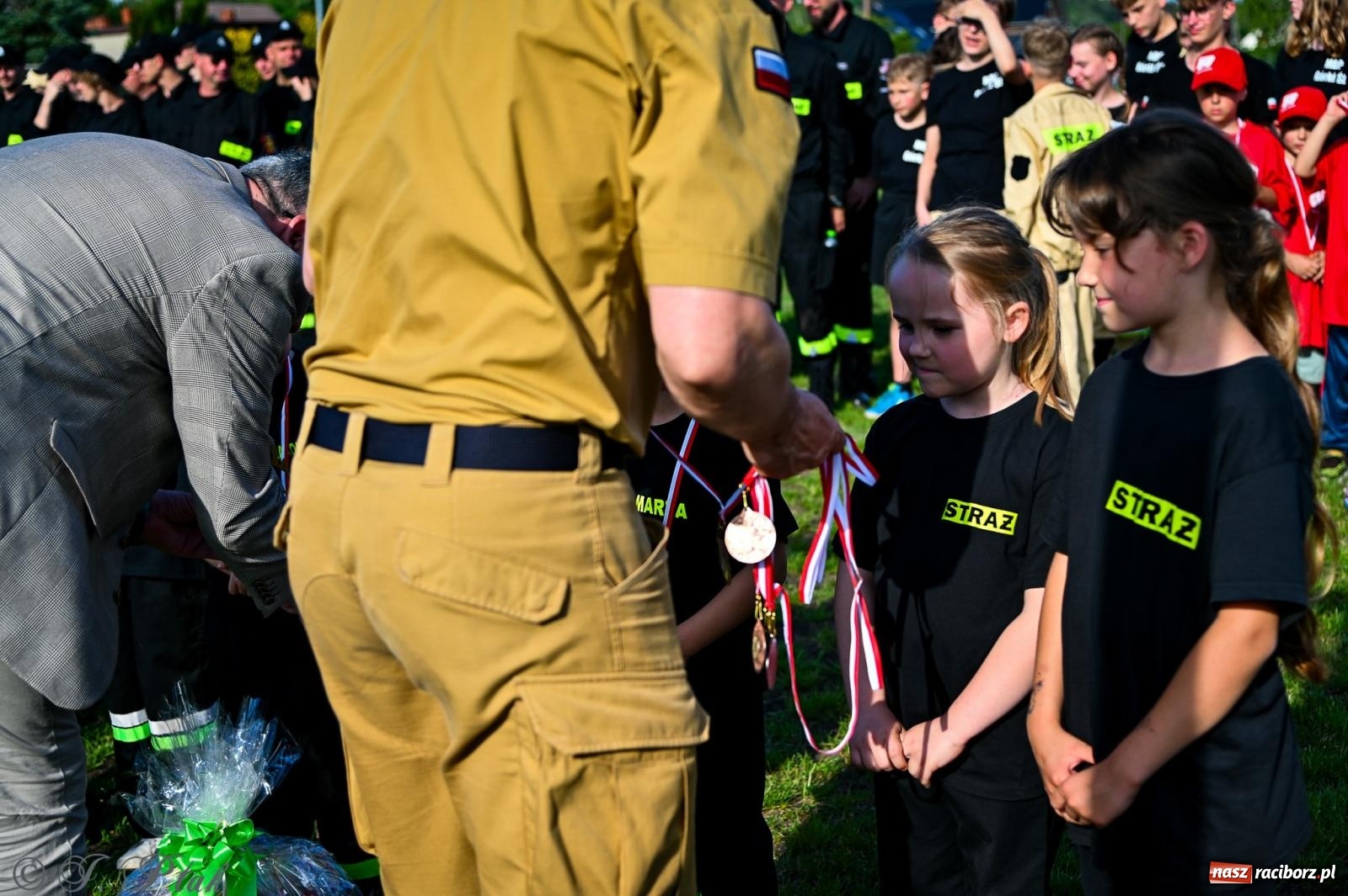 Zdjęcie w galerii na portalu naszraciborz.pl: Zawody sportowo-pożarnicze w Górkach Śląskich. Strażacka rywalizacja mimo kapryśnej pogody wiadomości z regionu