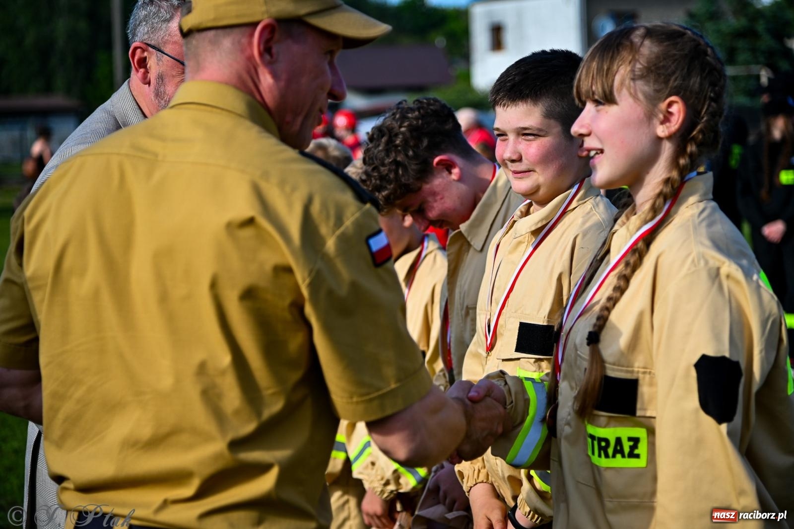 Zdjęcie w galerii na portalu naszraciborz.pl: Zawody sportowo-pożarnicze w Górkach Śląskich. Strażacka rywalizacja mimo kapryśnej pogody wiadomości z regionu