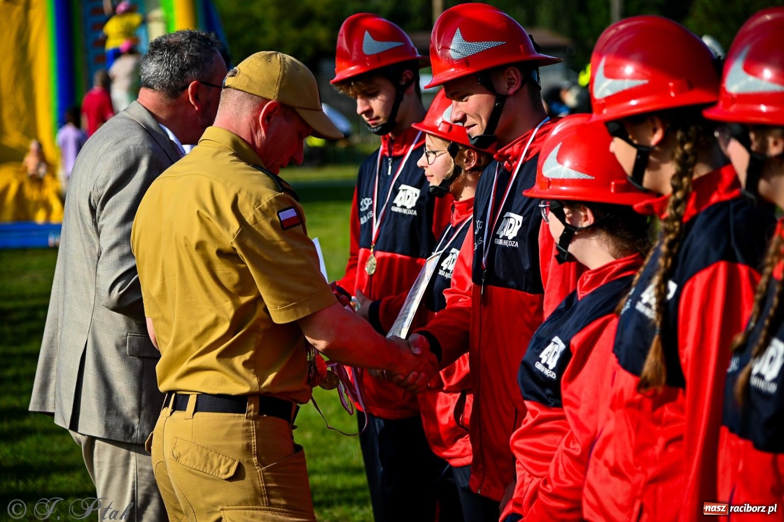 Zdjęcie w galerii na portalu naszraciborz.pl: Zawody sportowo-pożarnicze w Górkach Śląskich. Strażacka rywalizacja mimo kapryśnej pogody wiadomości z regionu