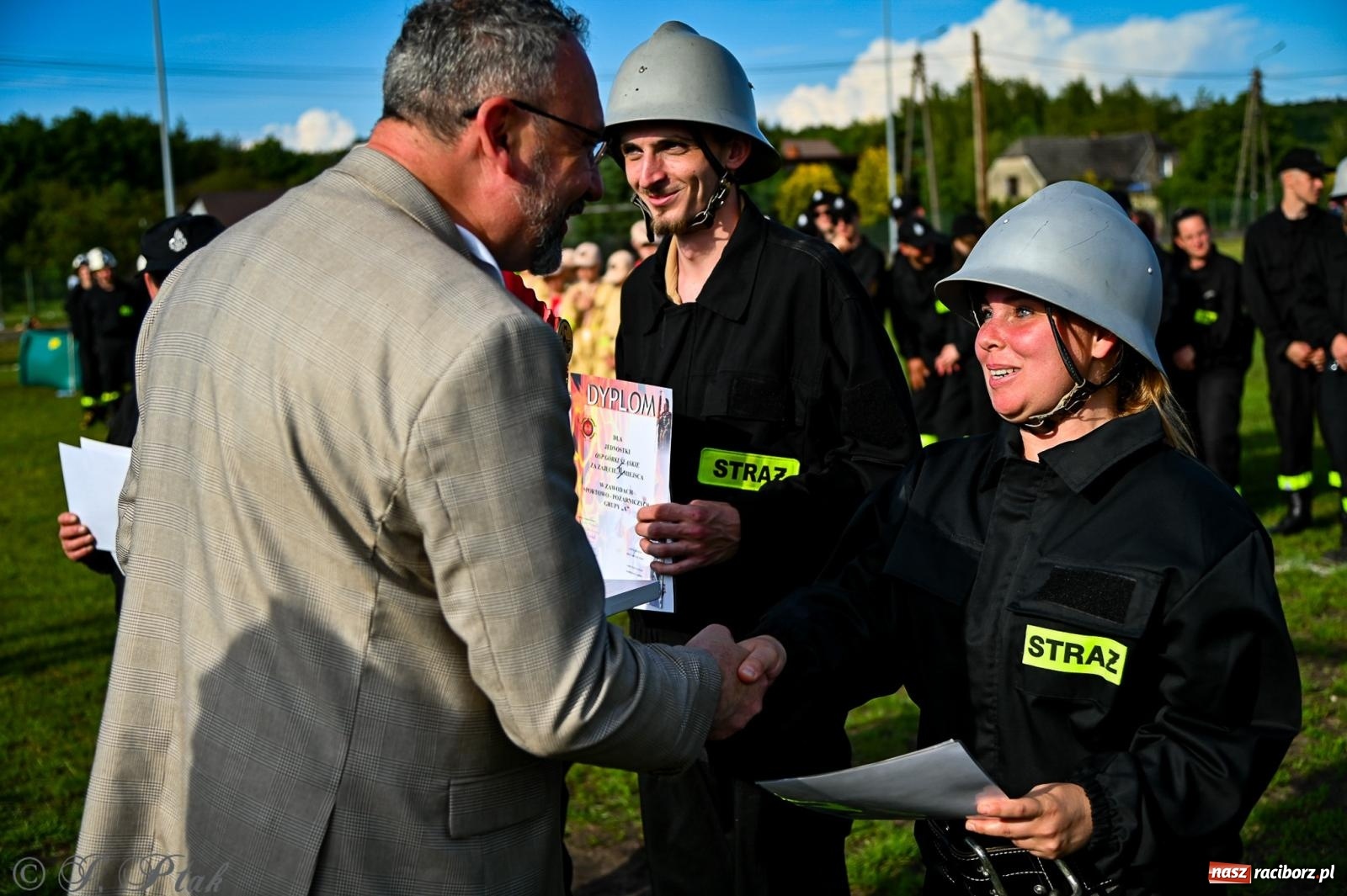 Zdjęcie w galerii na portalu naszraciborz.pl: Zawody sportowo-pożarnicze w Górkach Śląskich. Strażacka rywalizacja mimo kapryśnej pogody wiadomości z regionu