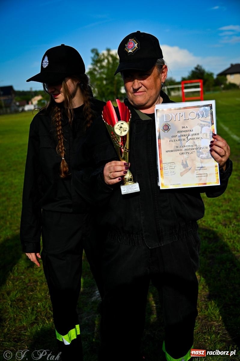 Zdjęcie w galerii na portalu naszraciborz.pl: Zawody sportowo-pożarnicze w Górkach Śląskich. Strażacka rywalizacja mimo kapryśnej pogody wiadomości z regionu