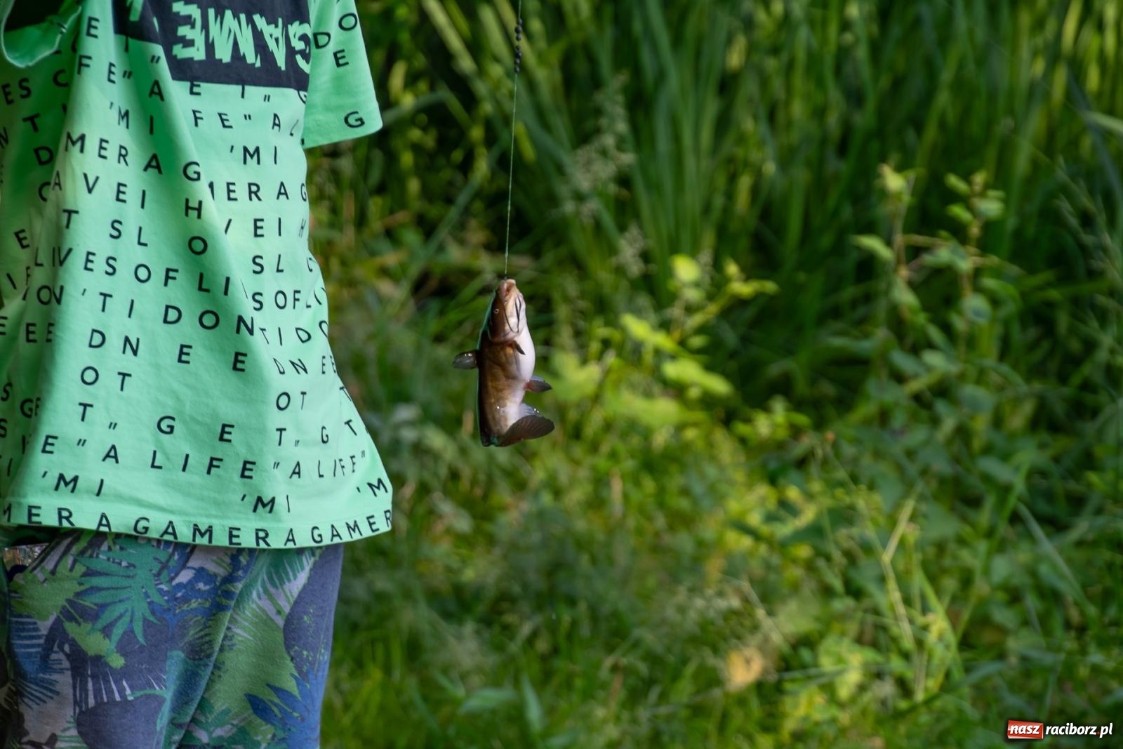 Zdjęcie w galerii na portalu naszraciborz.pl: Pod Oborą złowili taaaaką rybę! Zawody wędkarskie z okazji Dnia Dziecka wiadomości z regionu