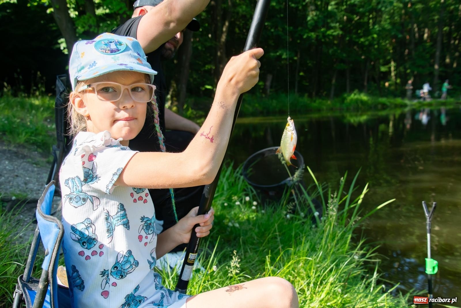 Zdjęcie w galerii na portalu naszraciborz.pl: Pod Oborą złowili taaaaką rybę! Zawody wędkarskie z okazji Dnia Dziecka wiadomości z regionu