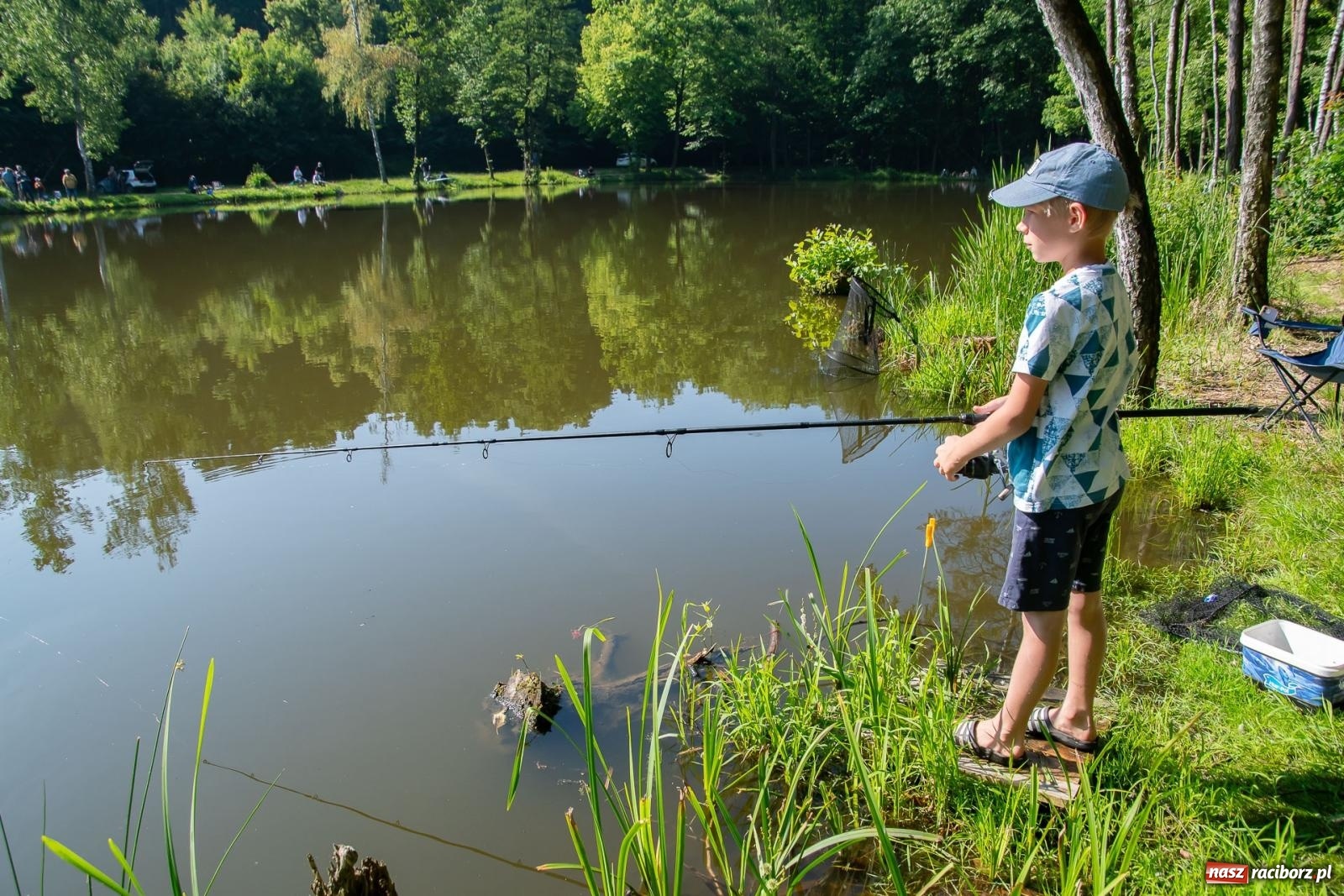 Zdjęcie w galerii na portalu naszraciborz.pl: Pod Oborą złowili taaaaką rybę! Zawody wędkarskie z okazji Dnia Dziecka wiadomości z regionu
