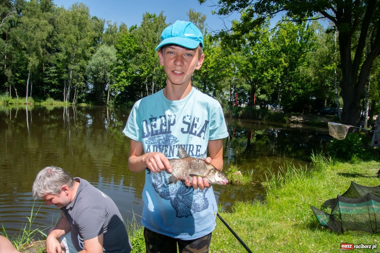 Zdjęcie w galerii na portalu naszraciborz.pl: Pod Oborą złowili taaaaką rybę! Zawody wędkarskie z okazji Dnia Dziecka wiadomości z regionu