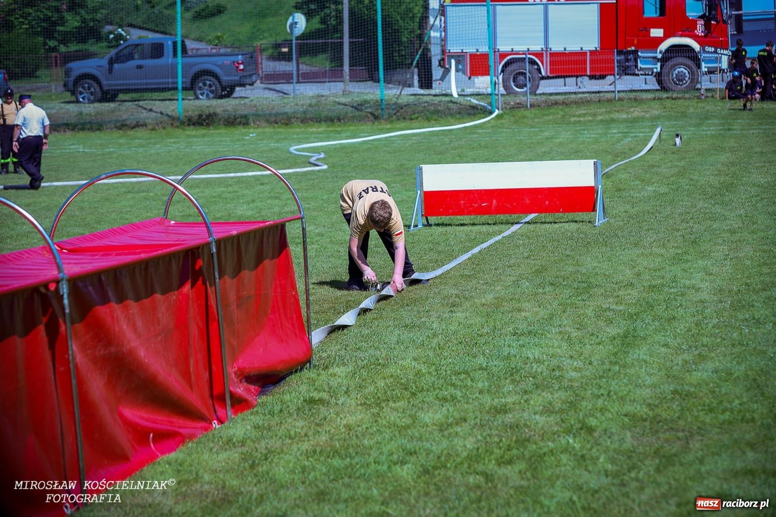 Zdjęcie w galerii na portalu naszraciborz.pl: Gminne zawody sportowo-pożarnicze w Rudniku. O wygranej zdecydowała sekunda [FOTO] wiadomości z regionu