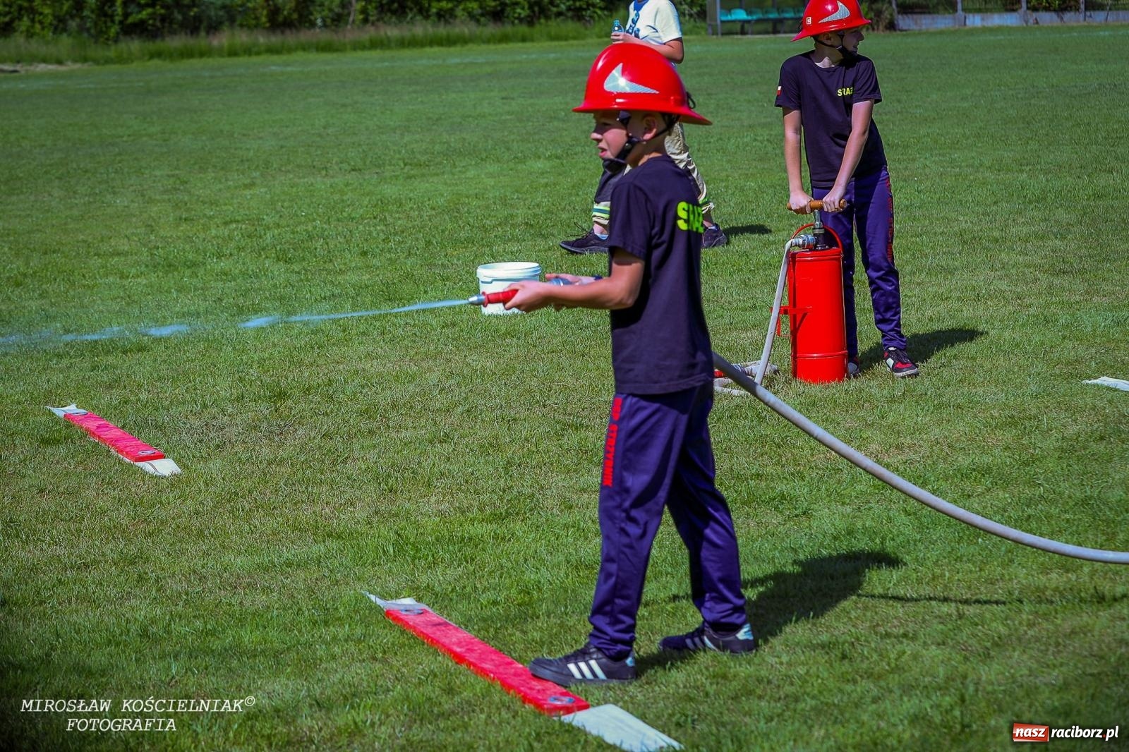 Zdjęcie w galerii na portalu naszraciborz.pl: Gminne zawody sportowo-pożarnicze w Rudniku. O wygranej zdecydowała sekunda [FOTO] wiadomości z regionu