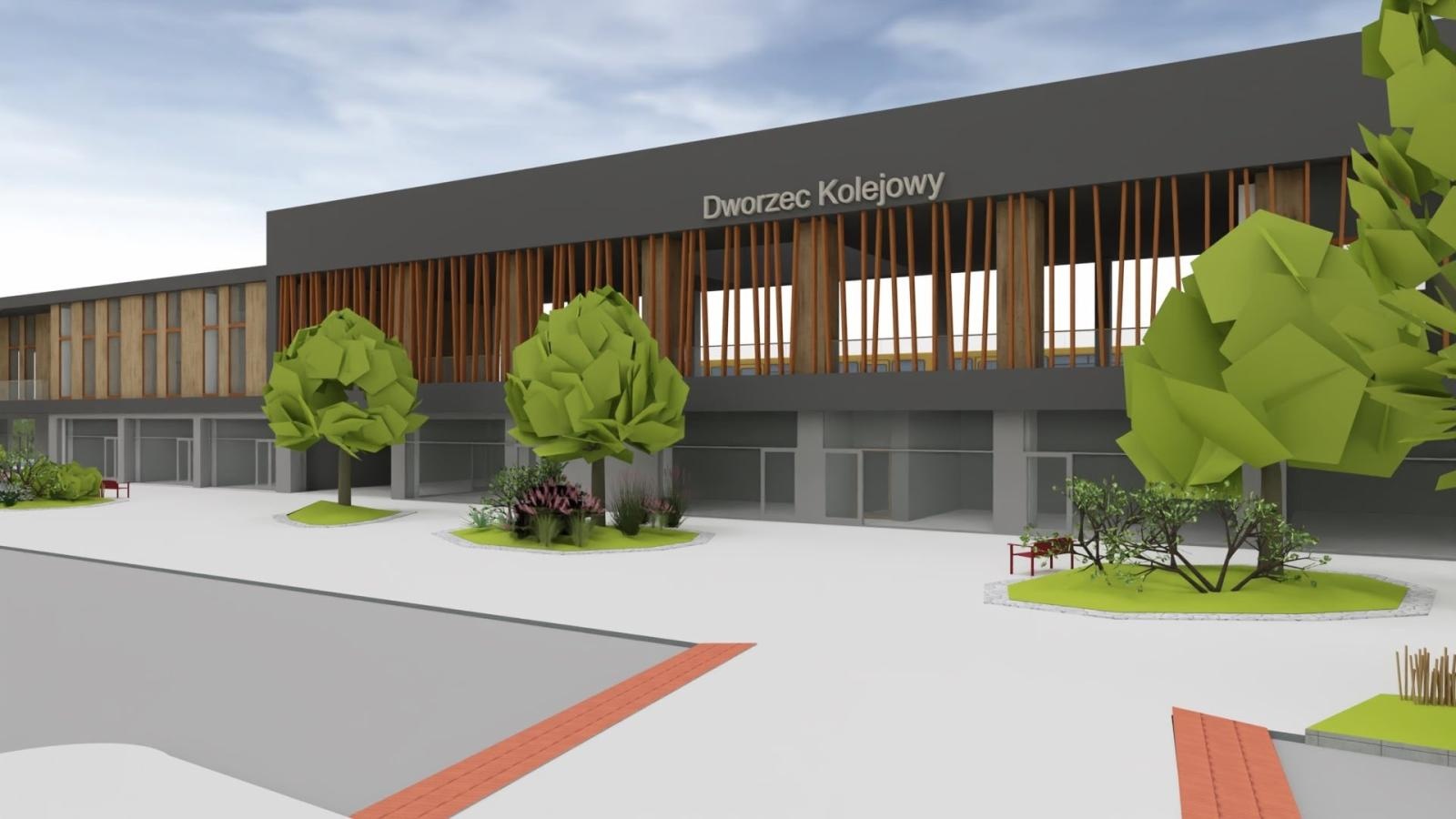 Zdjęcie w galerii na portalu naszraciborz.pl: Donice i drzewa przed dworcem PKP w Raciborzu. Radny pokazuje jak miało być i pyta o koszty wiadomości z regionu