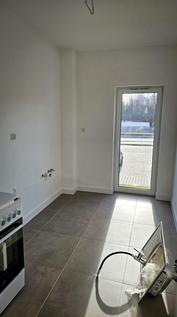 Zdjęcie w galerii na portalu naszraciborz.pl: Lokatorzy odebrali klucze. Pierwszy z dwóch nowych bloków przy Łąkowej gotowy do zamieszkania [FOTO] wiadomości z regionu