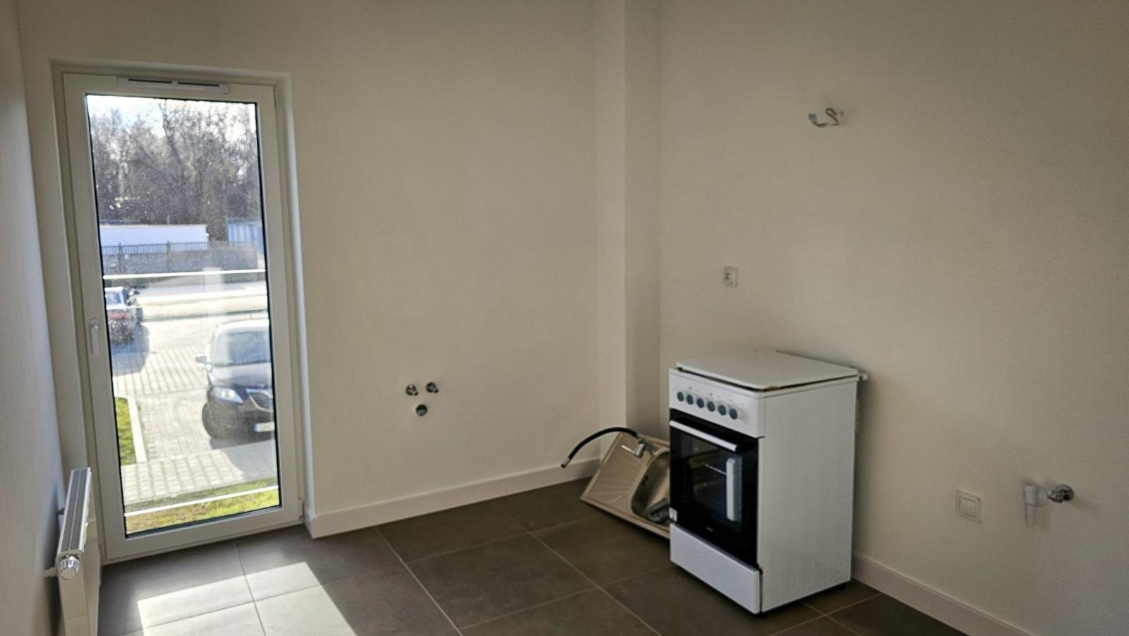 Zdjęcie w galerii na portalu naszraciborz.pl: Lokatorzy odebrali klucze. Pierwszy z dwóch nowych bloków przy Łąkowej gotowy do zamieszkania [FOTO] wiadomości z regionu