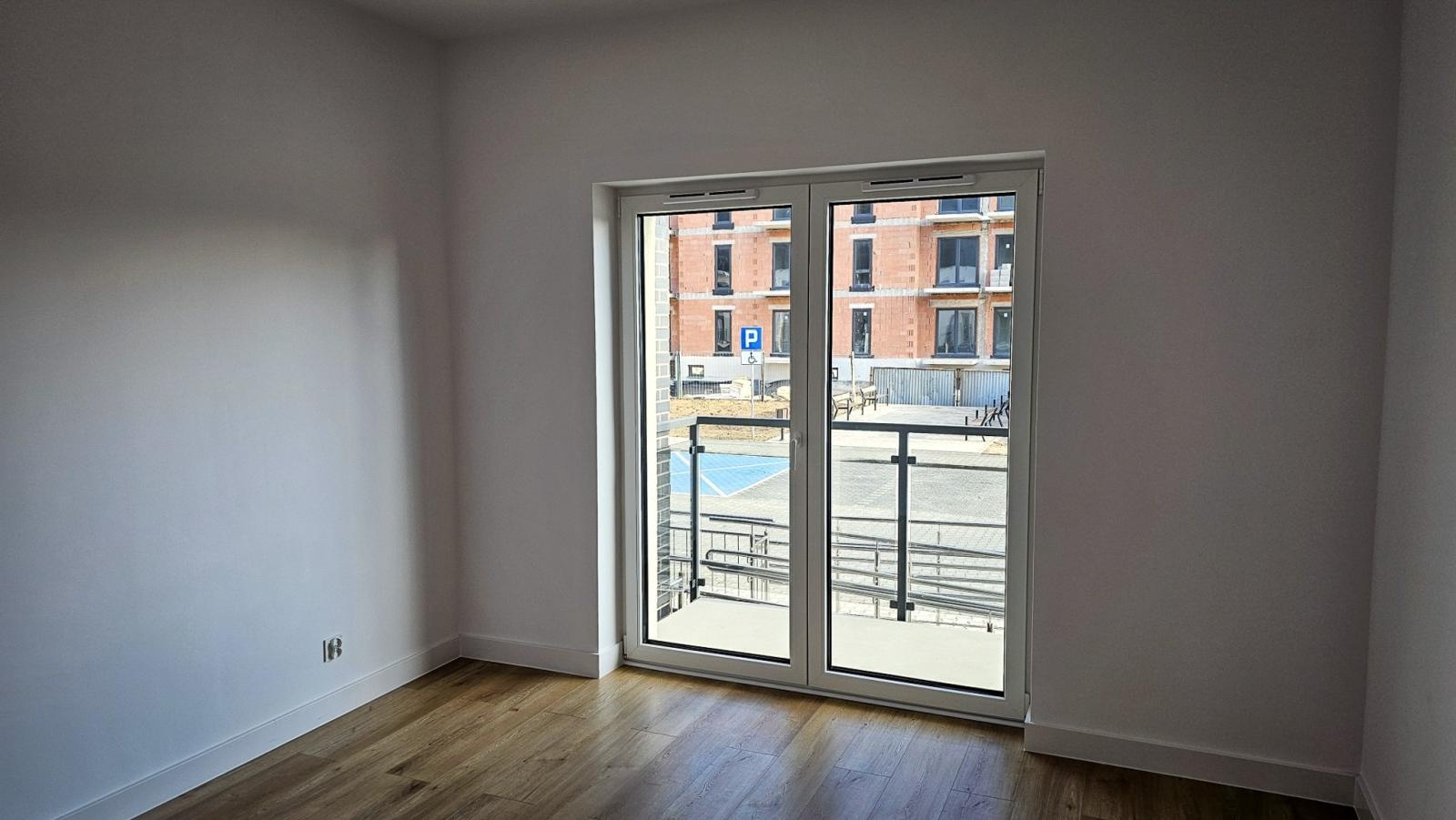 Zdjęcie w galerii na portalu naszraciborz.pl: Lokatorzy odebrali klucze. Pierwszy z dwóch nowych bloków przy Łąkowej gotowy do zamieszkania [FOTO] wiadomości z regionu